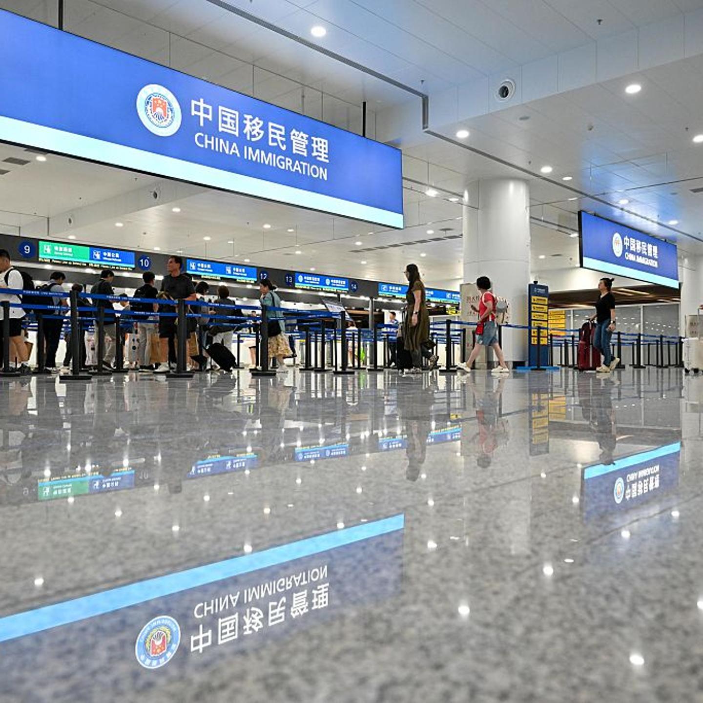 Passengers queue for immigration inspection at Terminal 1 of Tianjin Binhai International Airport in Tianjin, China, on Aug. 27, 2025.