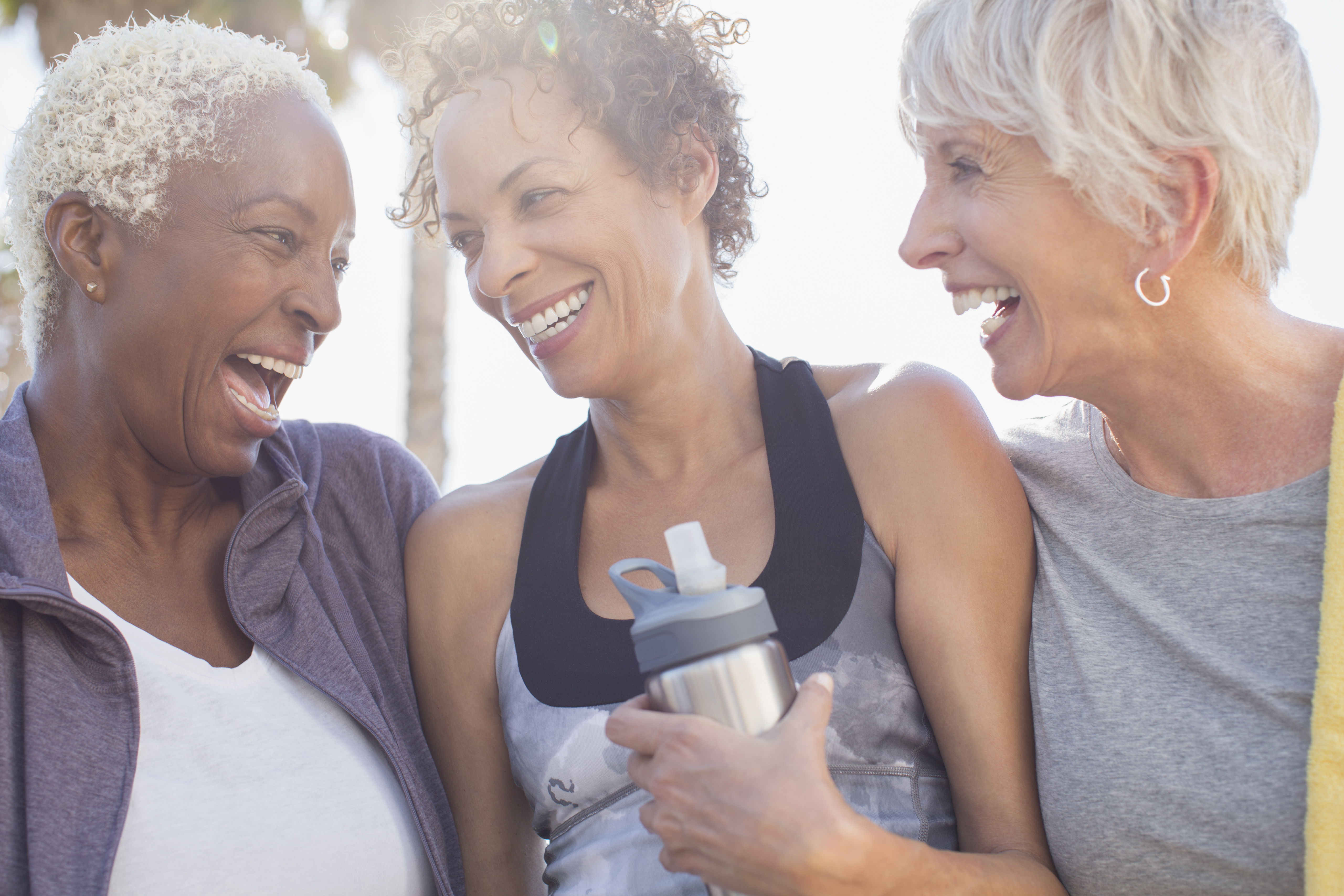 Women exercising and laughing