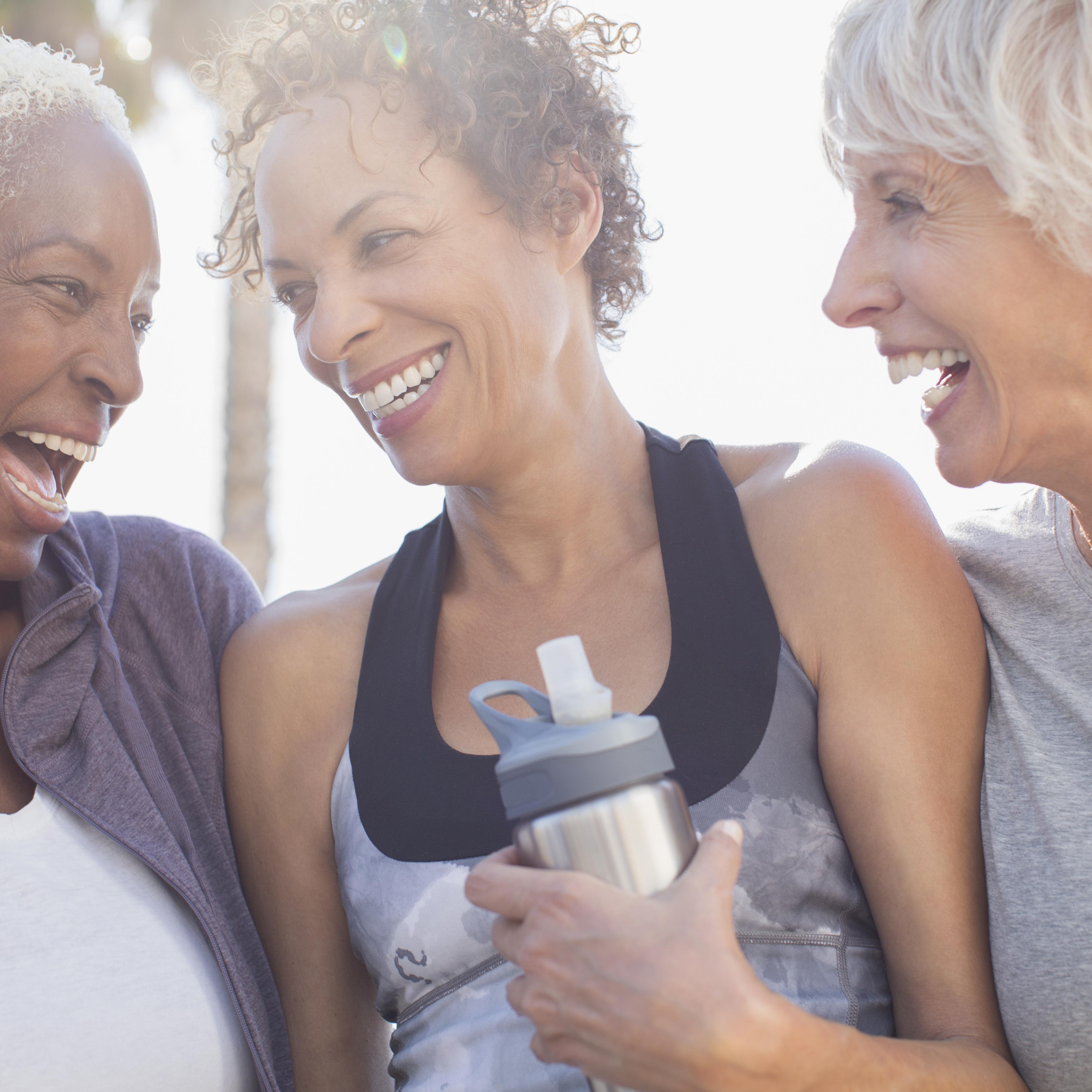 Women exercising and laughing