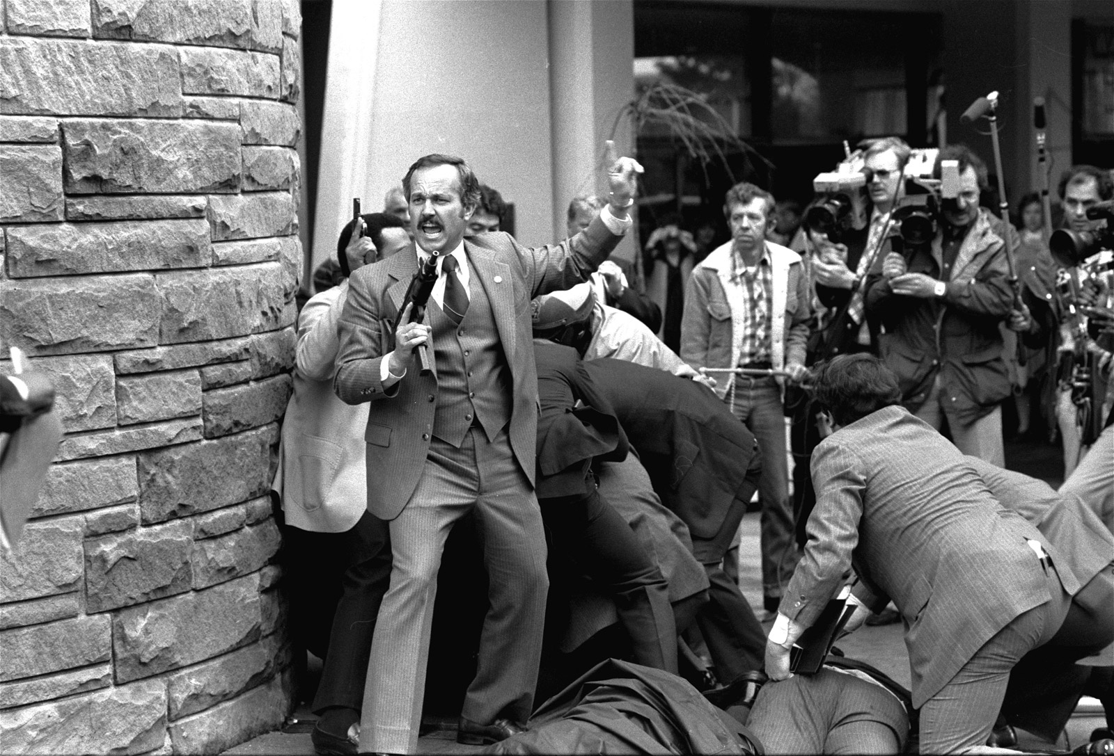 Ron Edmonds's Pulitzer Prize-winning photographs of John Hinckley's attempted  assassination of President Ronald Reagan on March 30, 1981.
