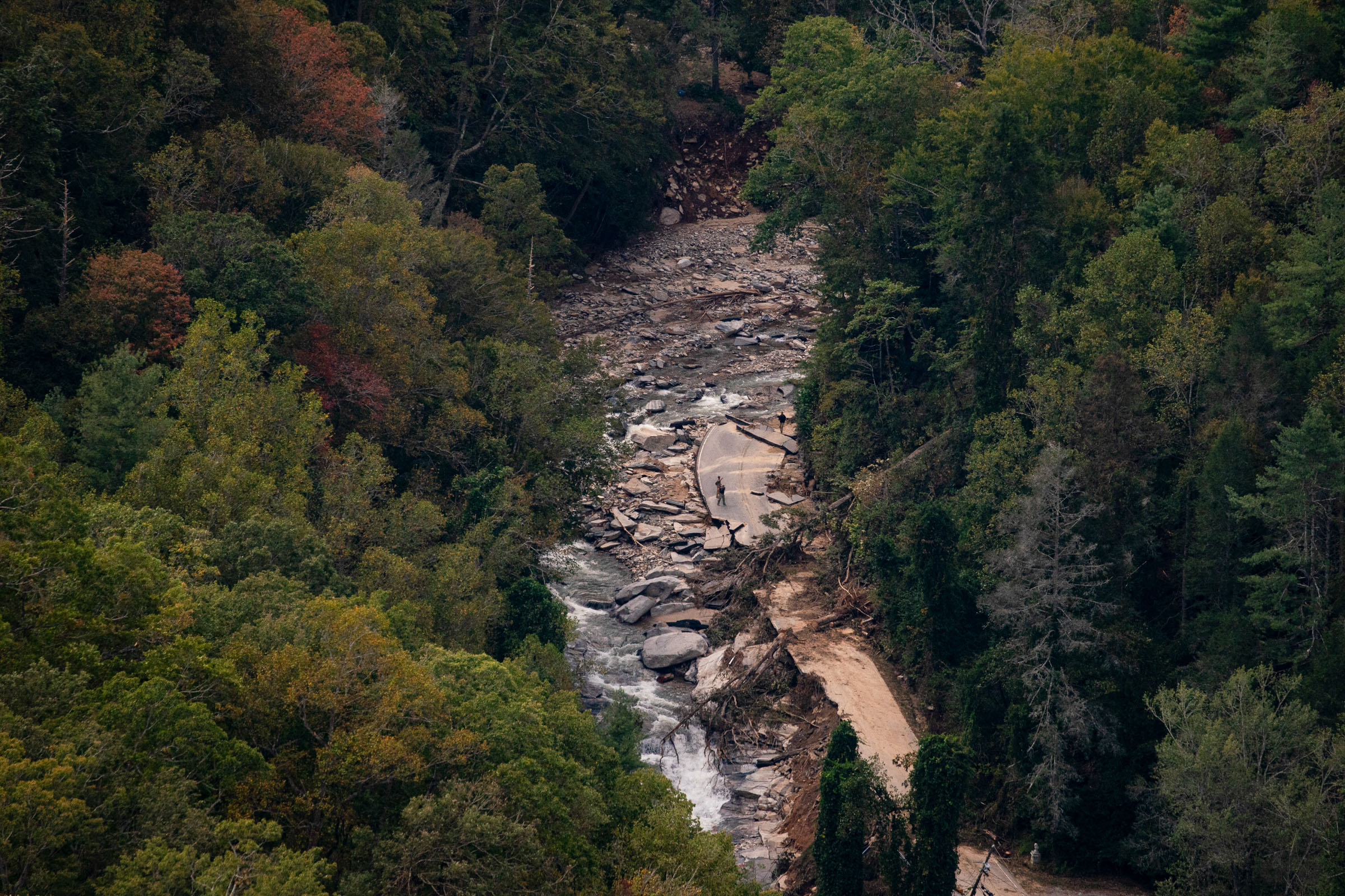 A road with damage from Hurricane Helene near Asheville, N.C., on Wednesday, Oct. 2, 2024. (Al Drago/The New York Times)
