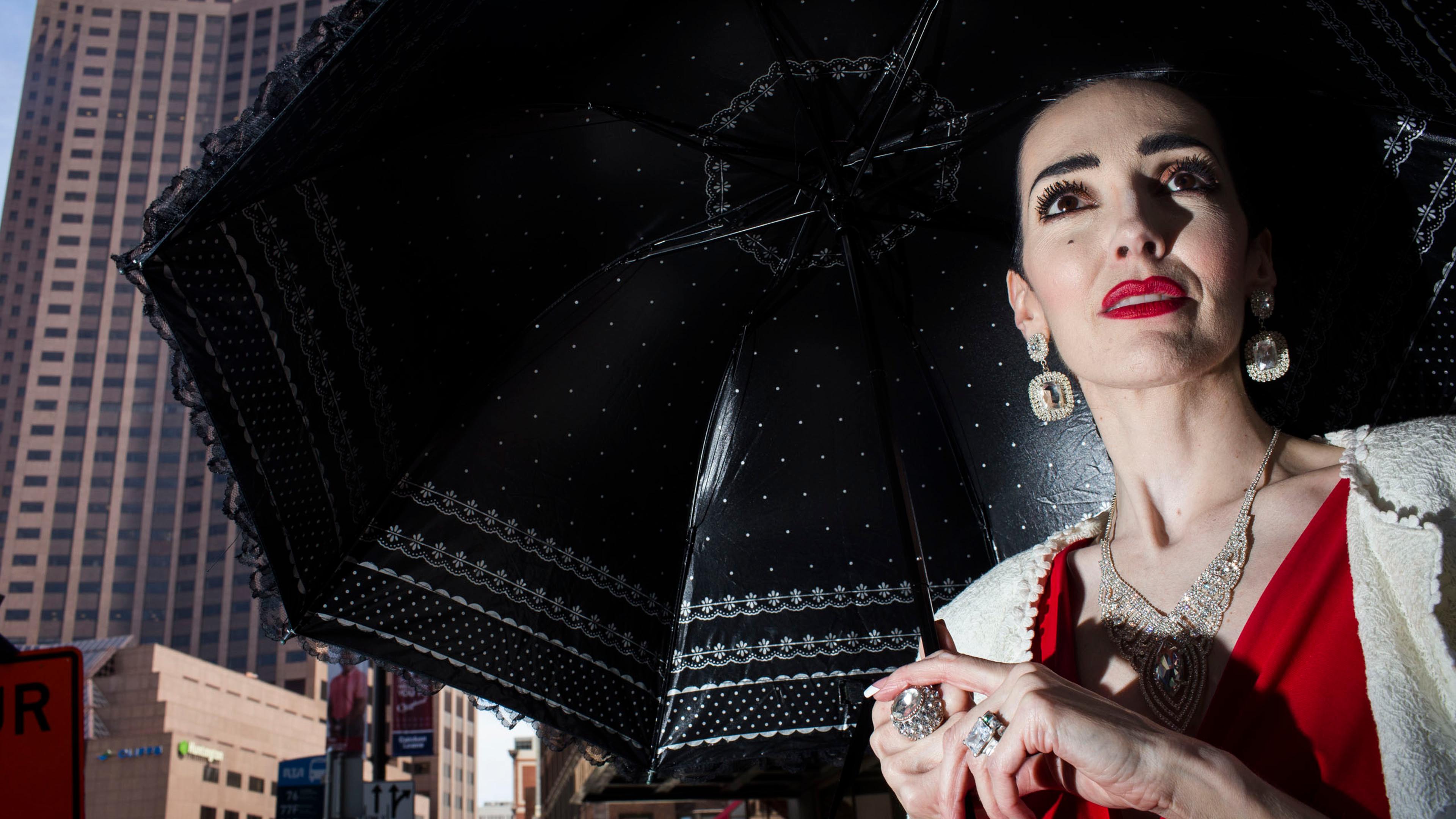 Donald Trump supporter Rachel Day, from Akron, stands outside the Republican National Convention in Cleveland on Wednesday, July 20, 2016.