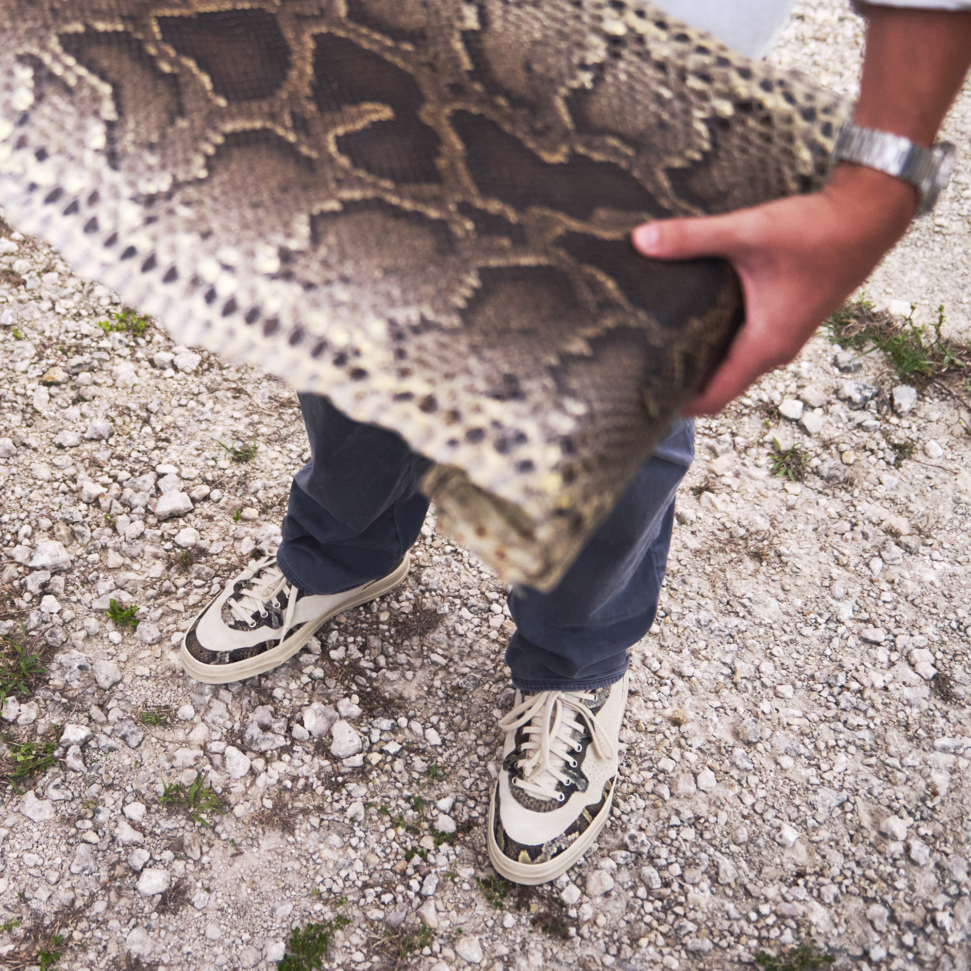 A before and after shot of a python’s skin and P448’s shoes.