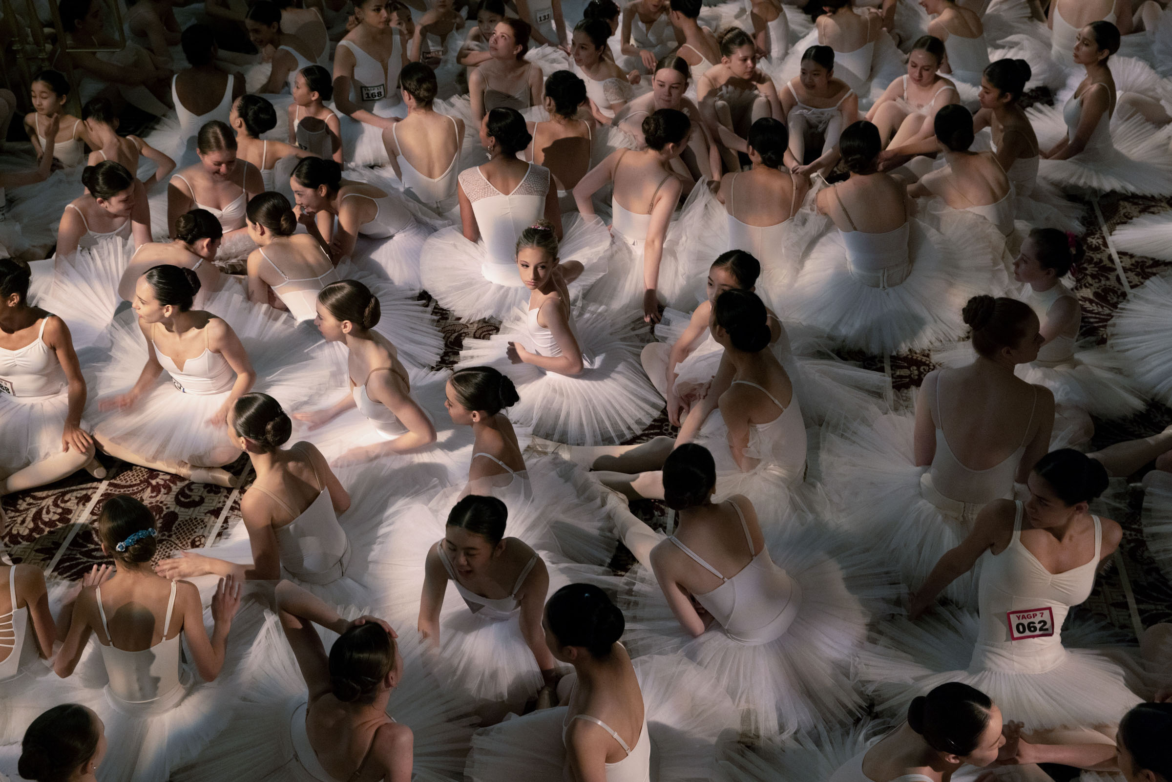 Ballerinas gather before setting the Guinness World Record for most ballerina dancers en pointe simultaneously. The record was achieved by Youth America Grand Prix (USA) as 353 dancers held en pointe for one minute at the Plaza Hotel in New York, New Yor