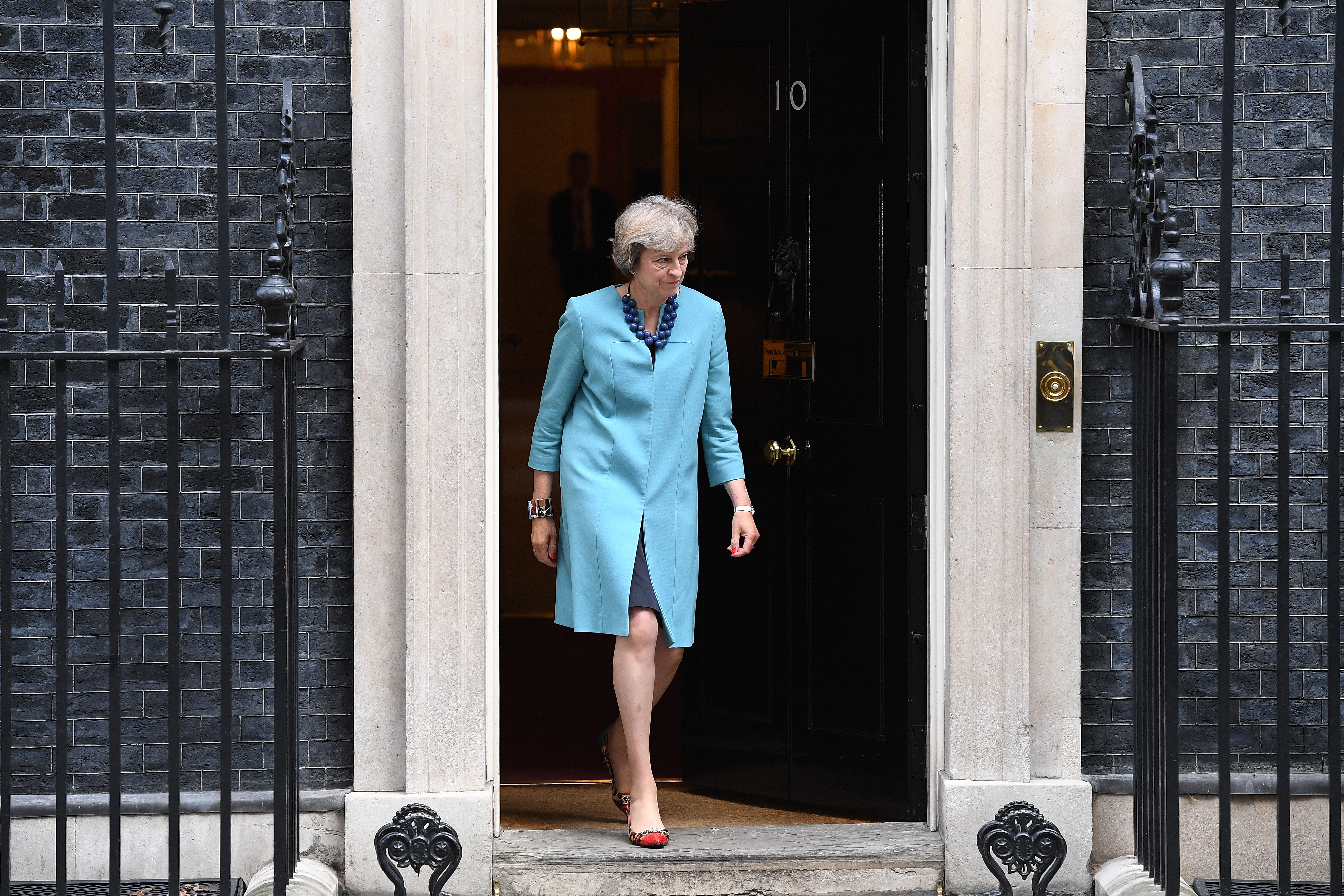 Theresa May Criticized For Wearing Leopard Print Heels