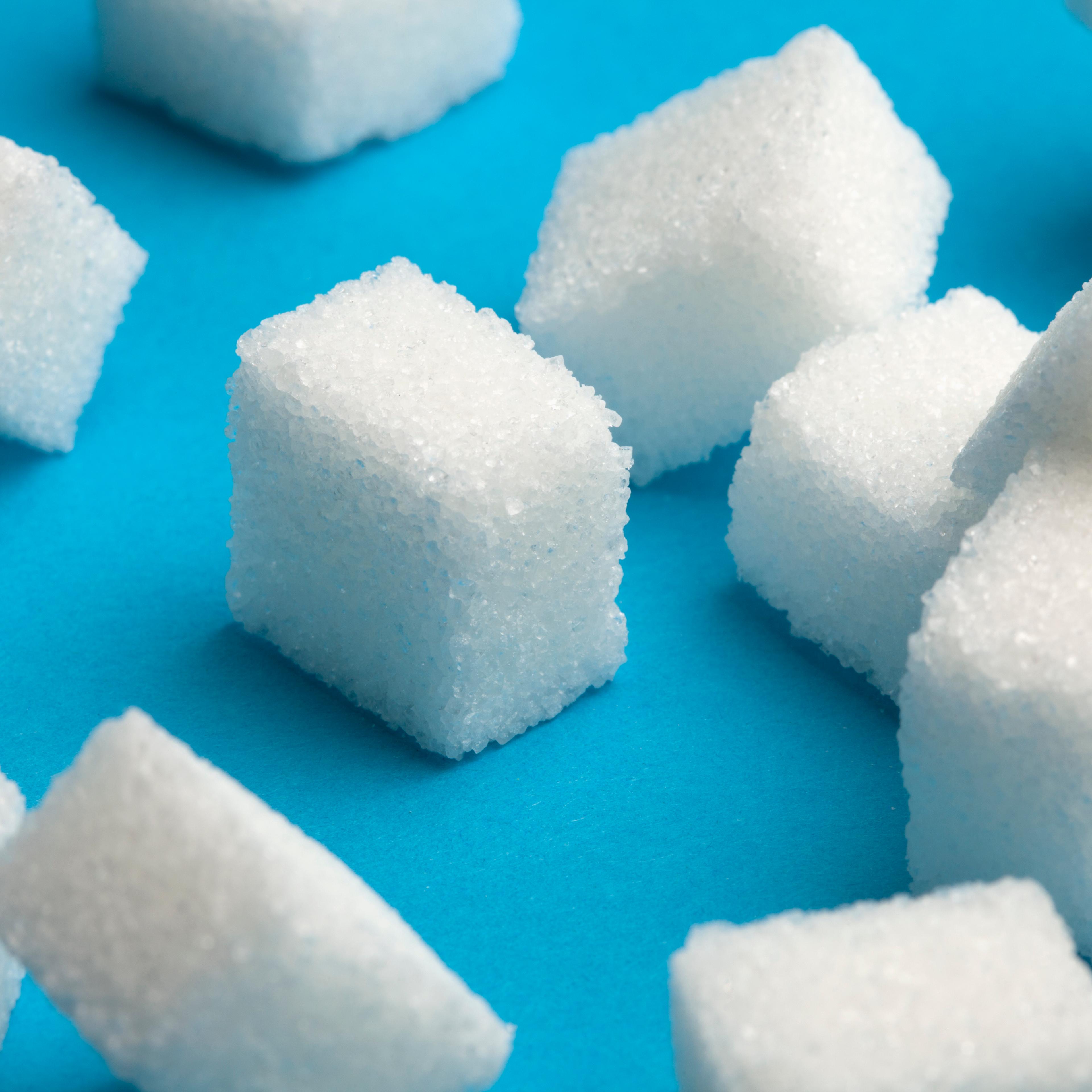 Sugar cubes with one standing out in the middle