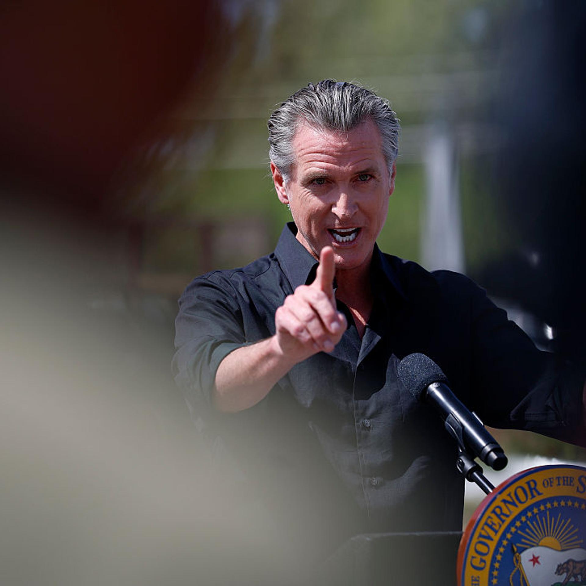 Calif. Gov. Gavin Newsom speaks during a news conference at Gemperle Orchard in Ceres, California on April 16, 2025.