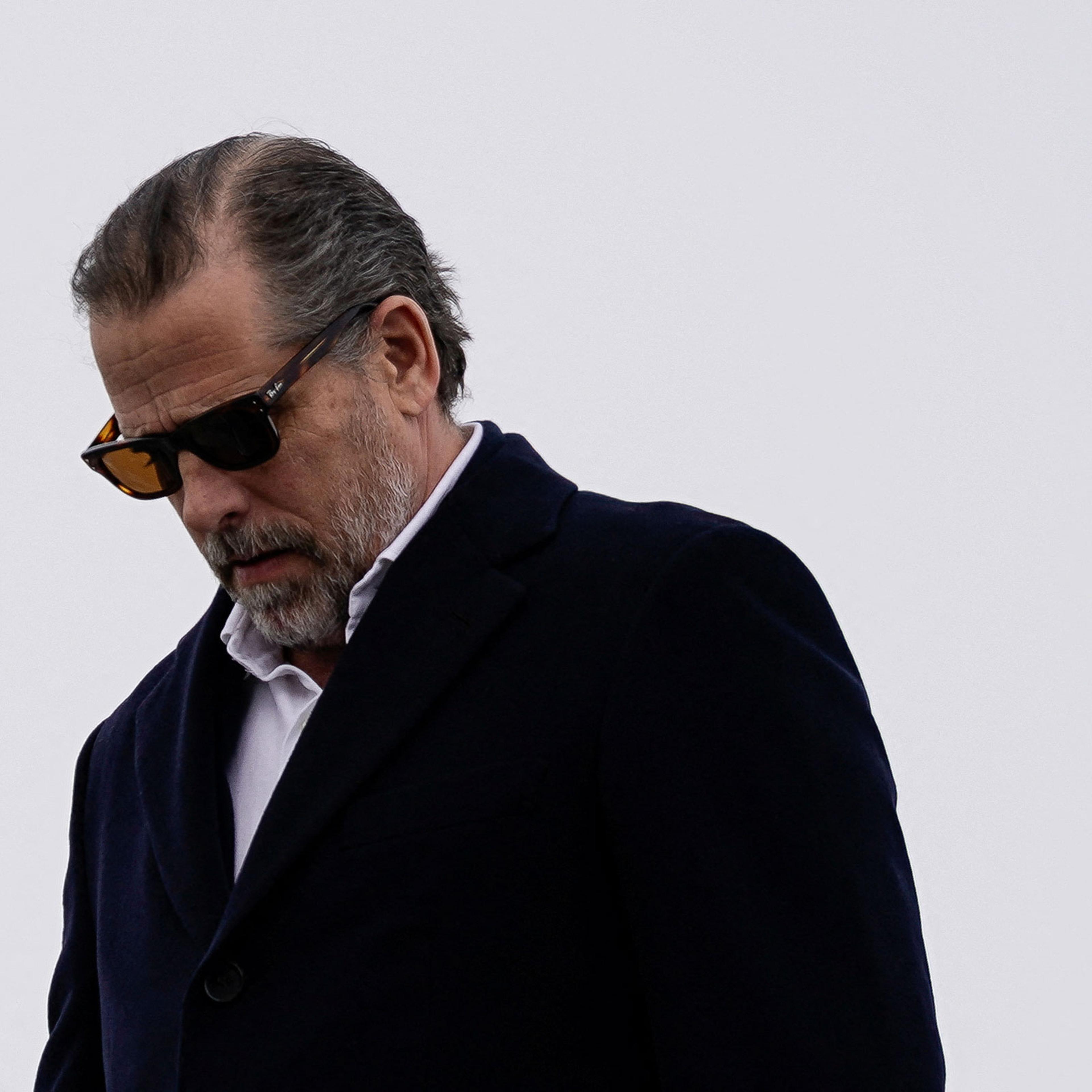 U.S. President Joe Biden and Hunter Biden disembark from Air Force One in Syracuse, New York