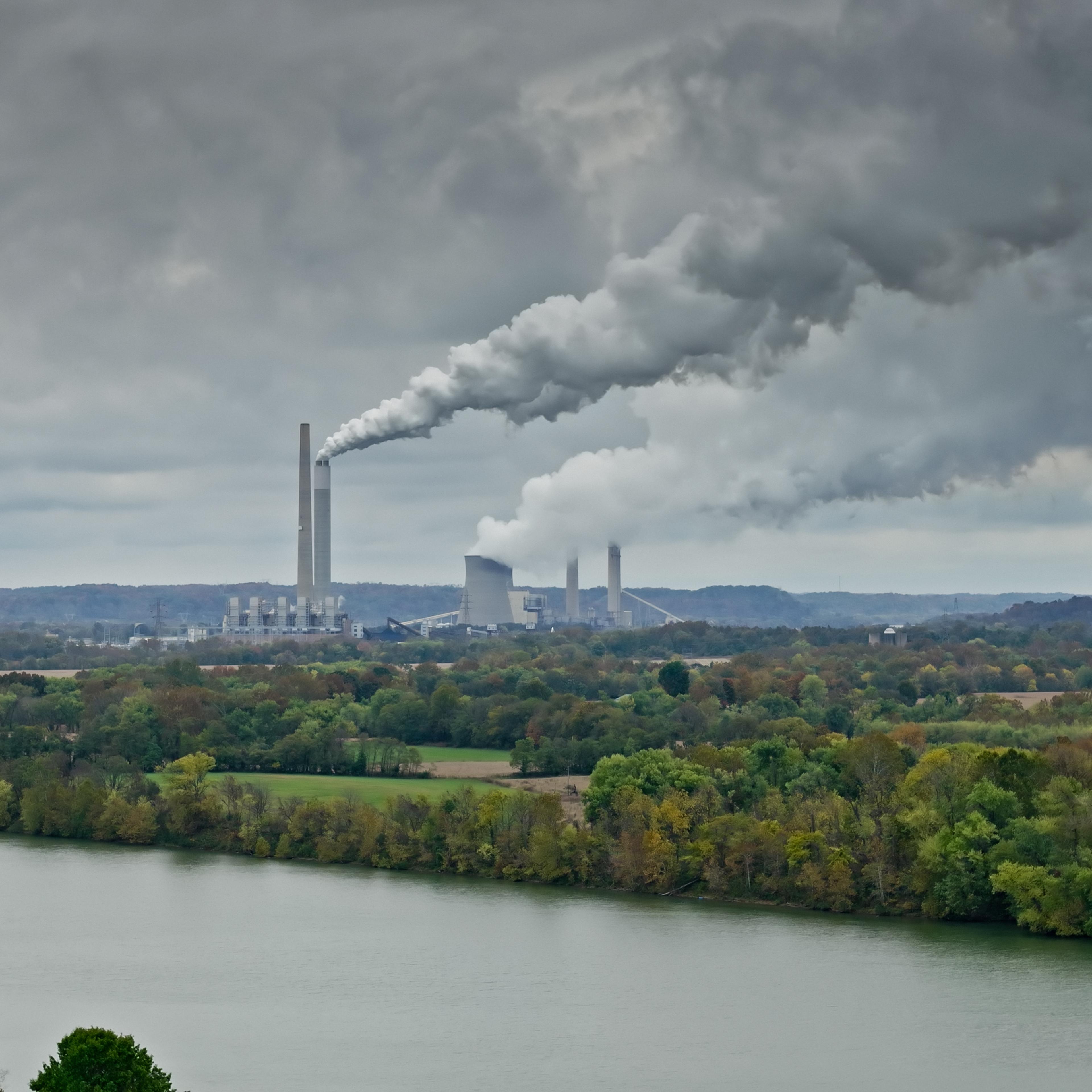 Drone shot looking across the Ohio River and the farmland and forest landscape on the West Virginia side towards Cheshire, Ohio. In the distance, Kyger Creek Power Plant and Gavin Power Plant are sending up plumes of smoke and steam into the overcast sky.
Due to groundwater contamination and air pollution, the owners of Gavin power Plant were forced to buy the properties of the residents of Cheshire; it is now almost a ghost town.