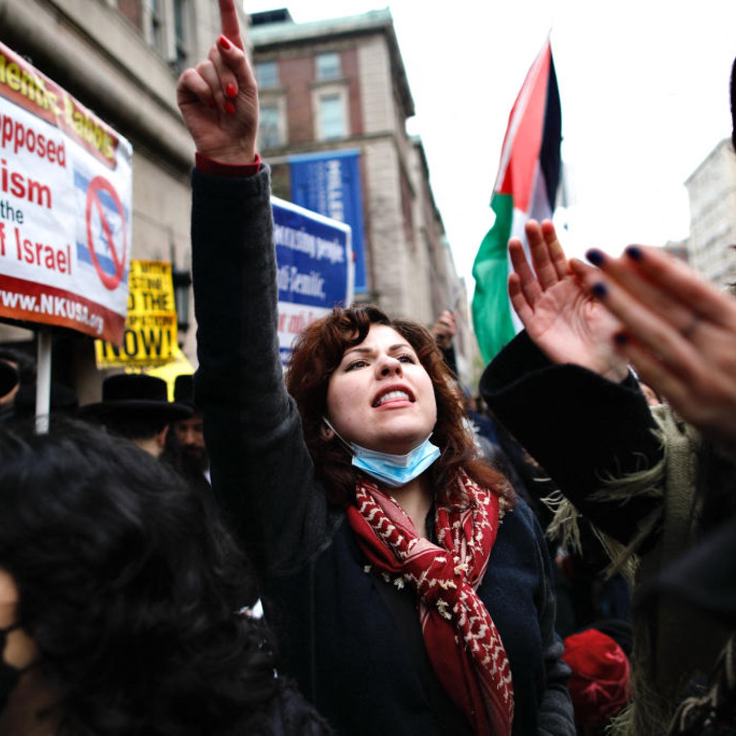 Pro-Palestinian protesters march outside Columbia University in New York City on April 18, 2024.