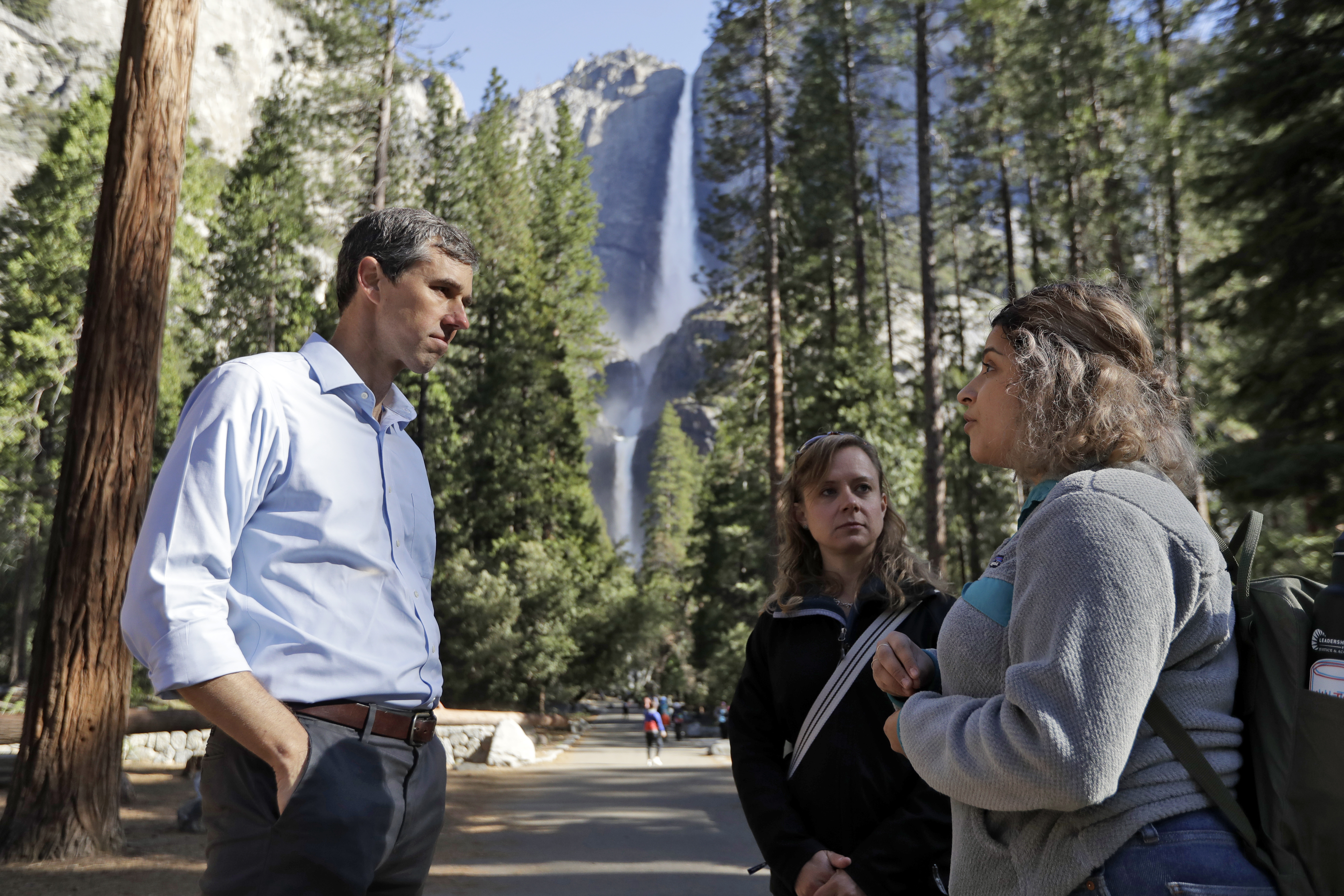 Democratic presidential candidate and former Texas congressman Beto O'Rourke, left, talks with Anne Kelly, center, Director of the Sierra Nevada Research Stations and environmental advocate Leslie Martinez center, Monday, April 29, 2019, in Yosemite Nati