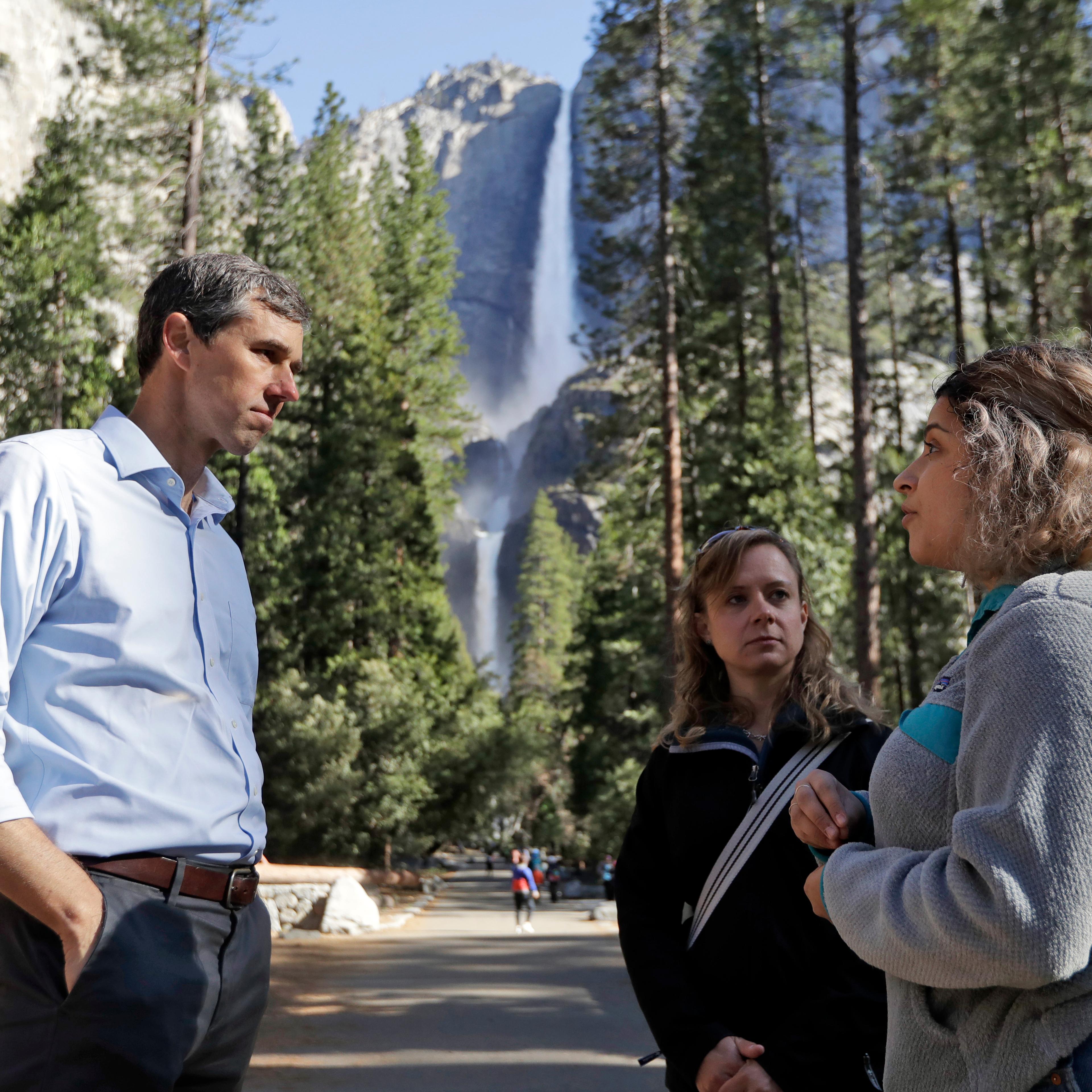 Democratic presidential candidate and former Texas congressman Beto O'Rourke, left, talks with Anne Kelly, center, Director of the Sierra Nevada Research Stations and environmental advocate Leslie Martinez center, Monday, April 29, 2019, in Yosemite Nati