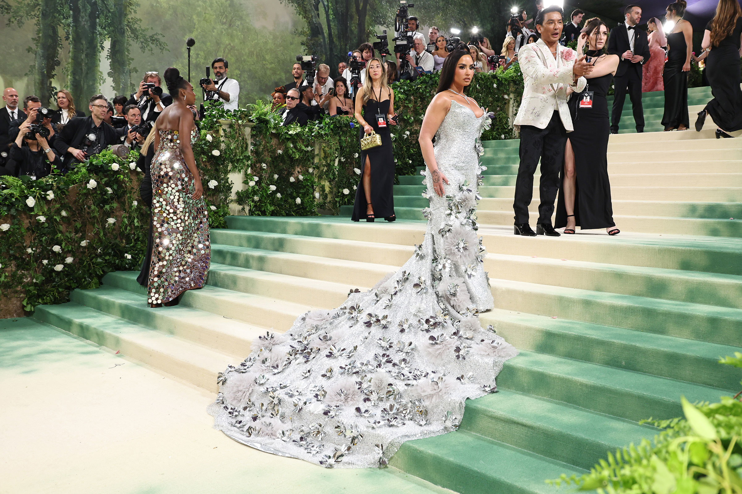 red carpet floral dresses Zendaya Changes From a Floral Dress to a Green Skirt Suit for Press Day