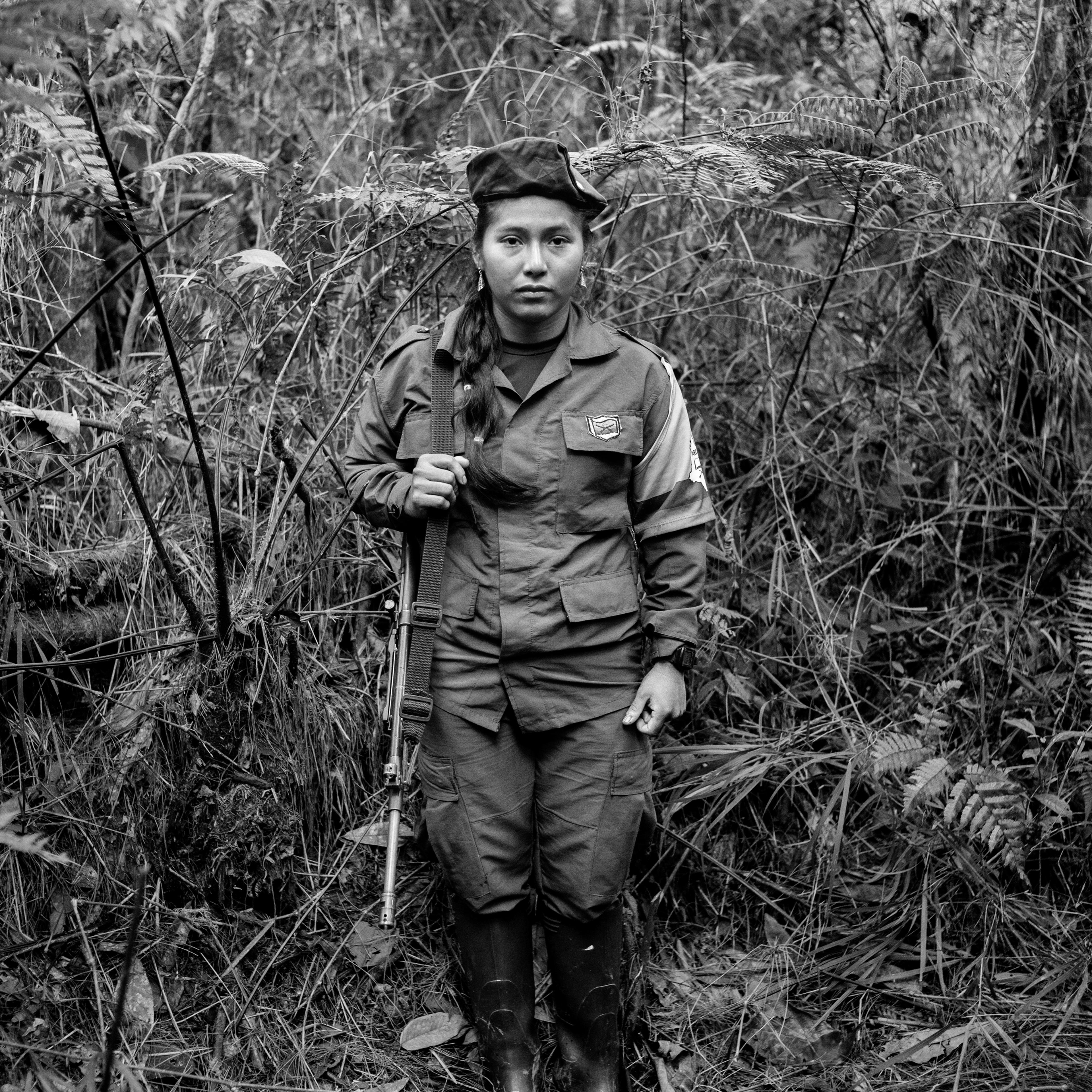 Portrait of Vicky, a member of FARC, at a camp, Cauca, Colombia, July 2016.