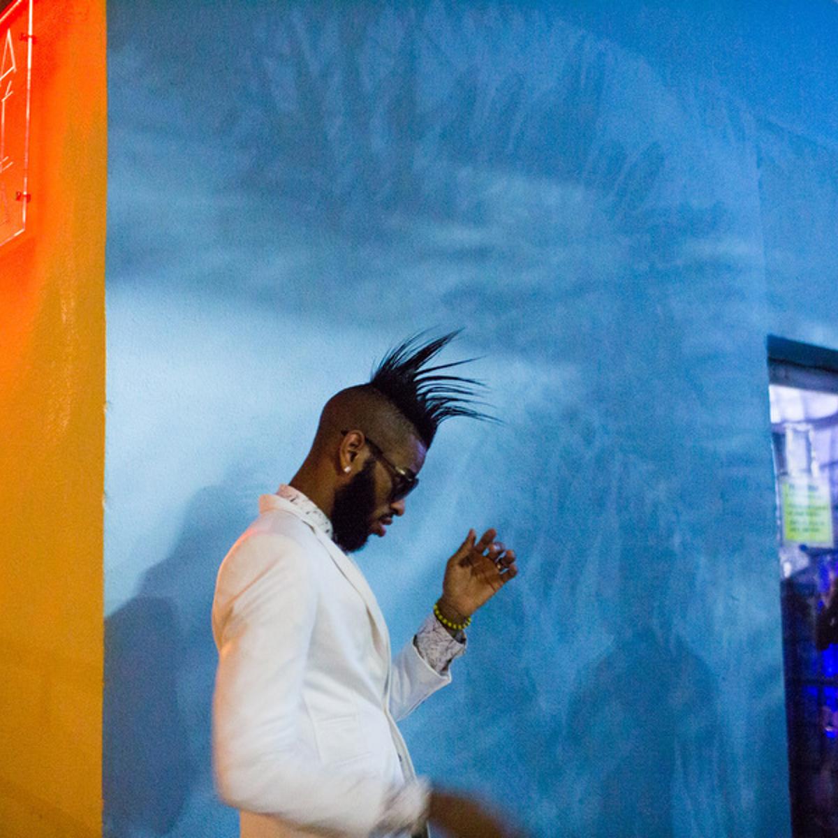 November 6, 2015 -Reggaeton artist El Yonki before his concert Varadero, Cuba. HIs spiky hair is synonymous with the genre, as he was the first come out with the long-on-top, shaved sides look. Here, Yonki preps for his first concert after several month