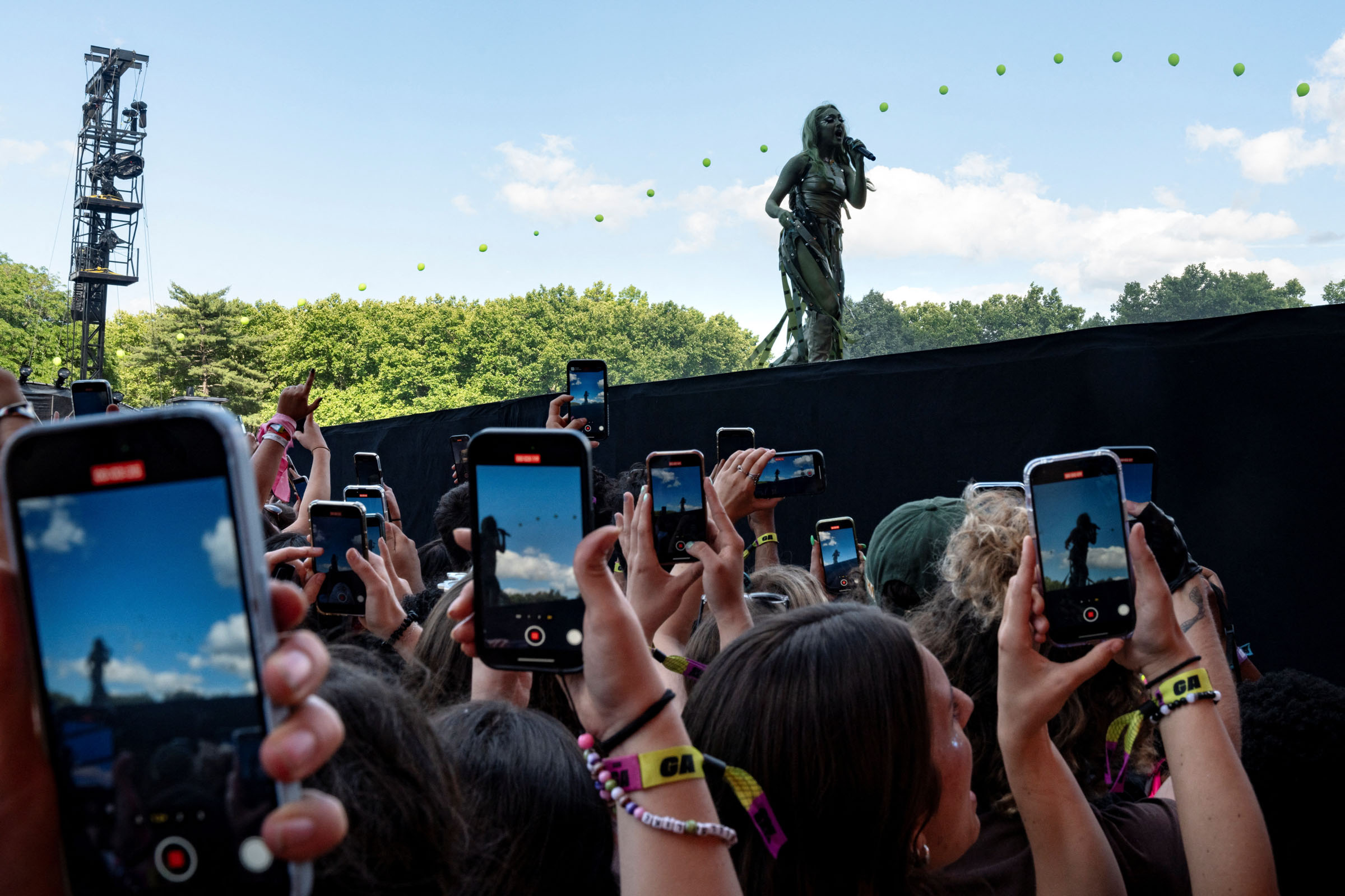 Revelers watch performances at the Governors Ball music festival