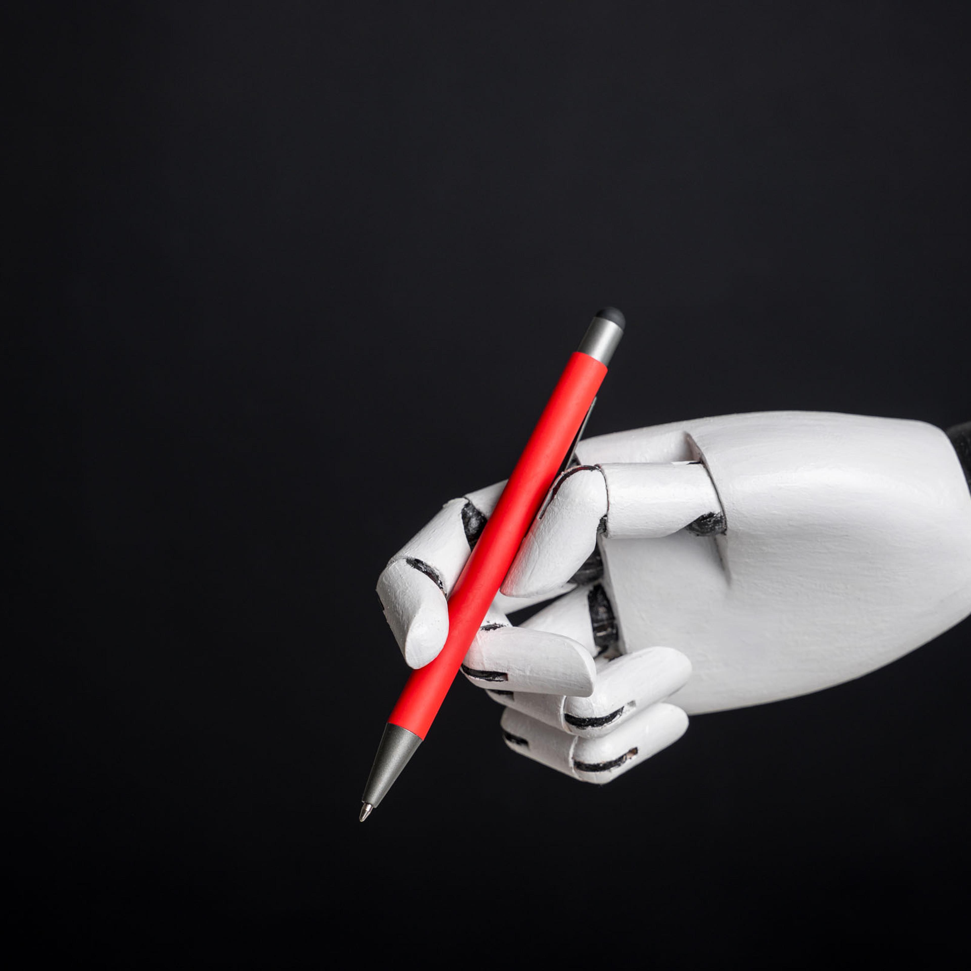 Robotic hand holding pen