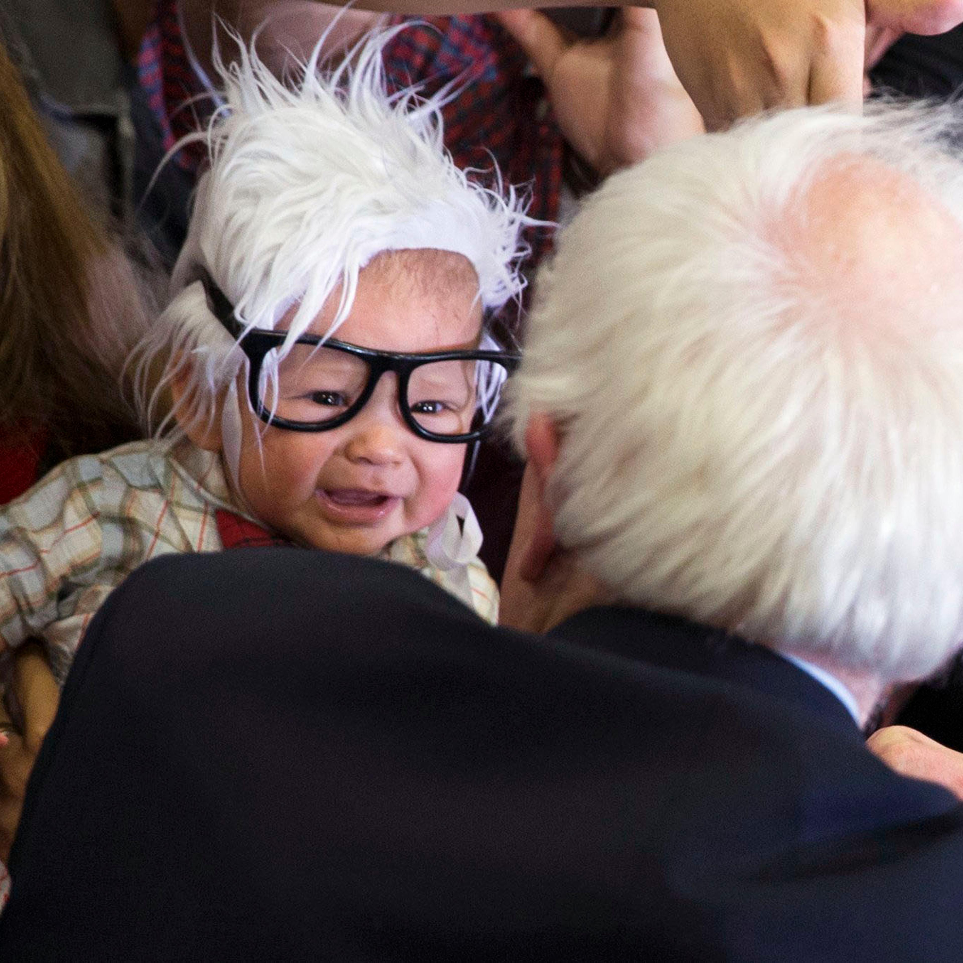 Democratic presidential candidate Sen. Bernie Sanders, I-Vt., meets 3-month-old Oliver Lomas, of Venice, Calif., during a rally at Bonanza High School, on Feb. 14, 2016, in Las Vegas.