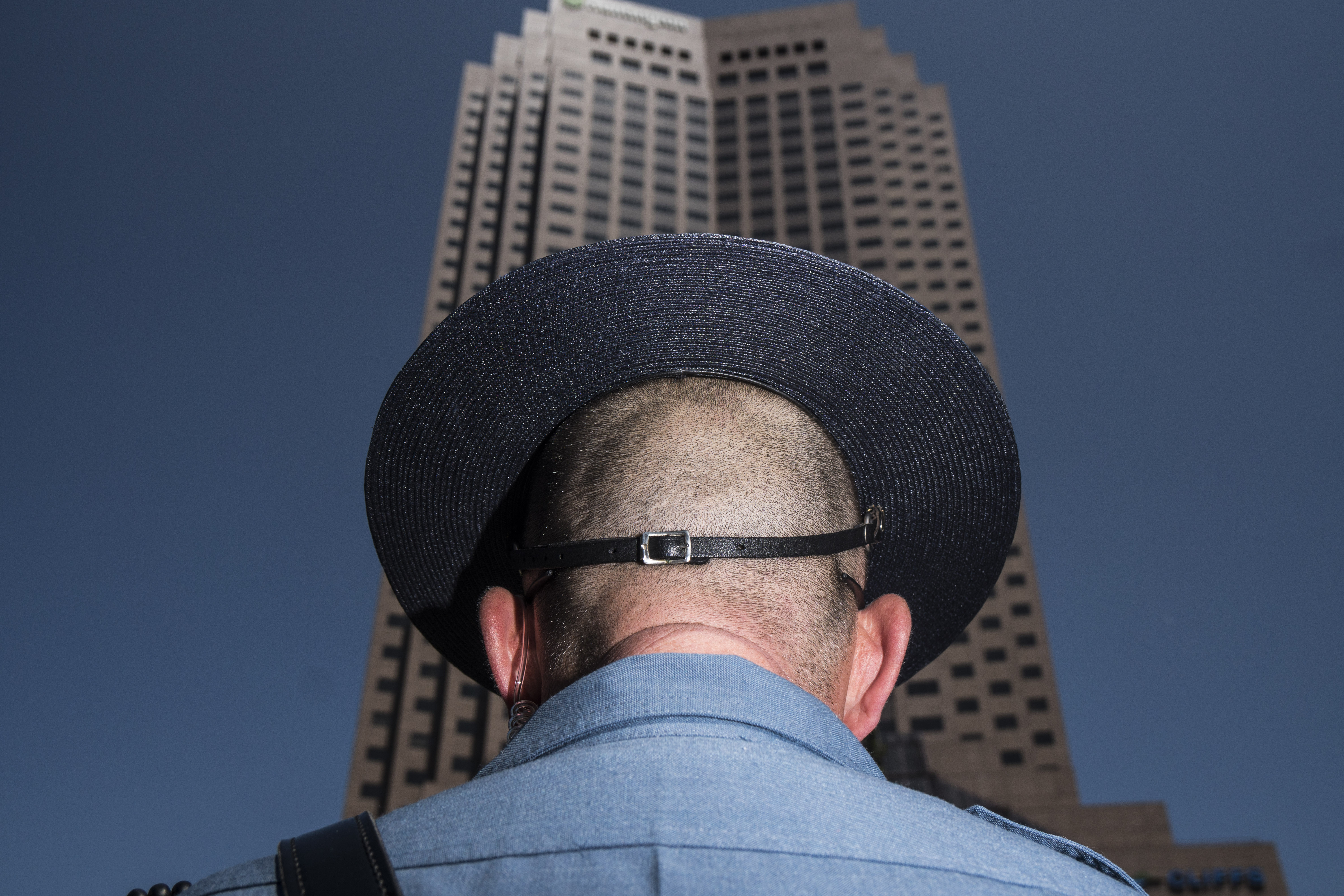 A police officer stands on a protective crowd control line in the Cleveland Public Square at the Republican National Convention in Cleveland on July 19, 2016.