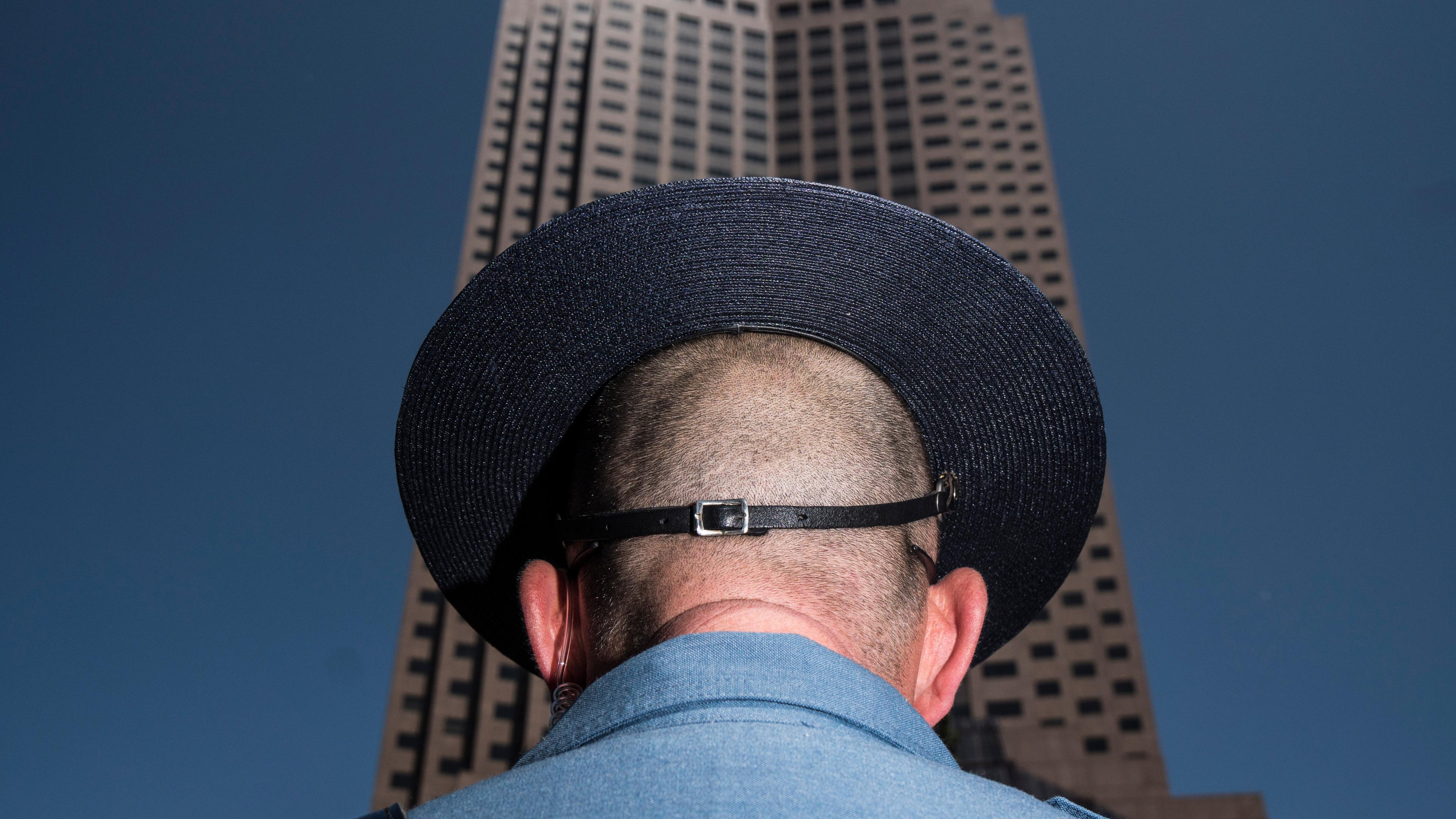 A police officer stands on a protective crowd control line in the Cleveland Public Square at the Republican National Convention in Cleveland on July 19, 2016.