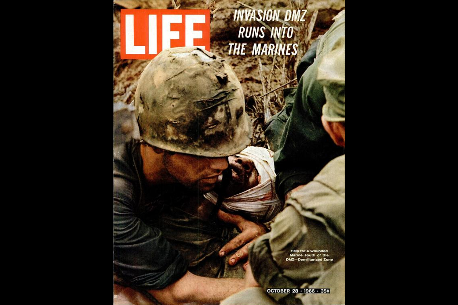 Vietnam War: Looking Again at Larry Burrows' Photo, 'Reaching Out'