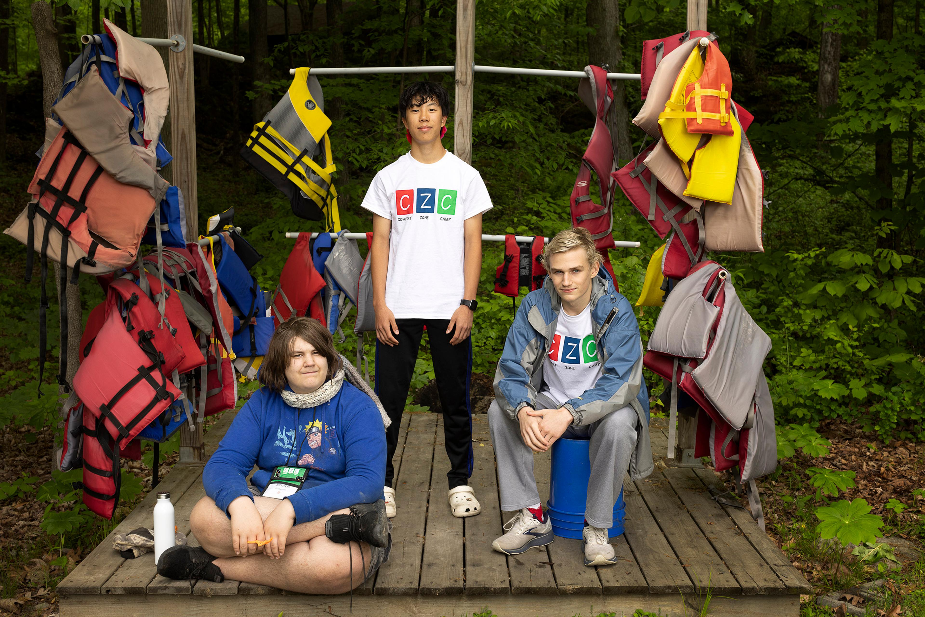 From left: Campers Dmitri Antonik, Jacob Mui, and Daniel Uribe near the lake.