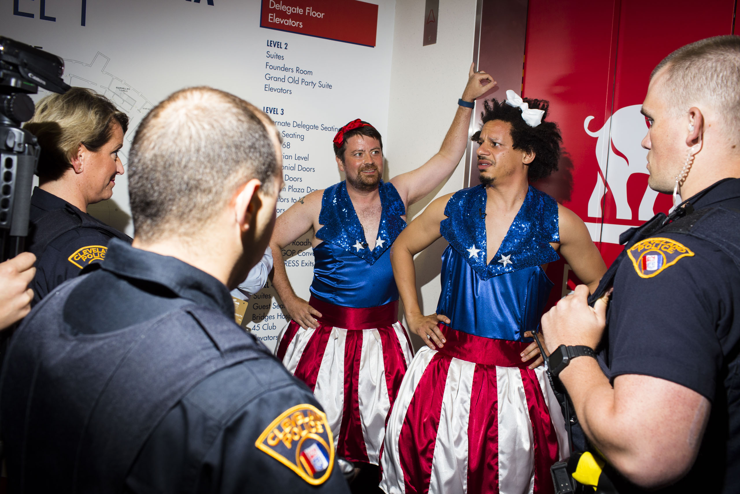 Comedian Eric Andre is escorted from the 2016 Republican National Convention in Cleveland on Tuesday, July 19, 2016.
