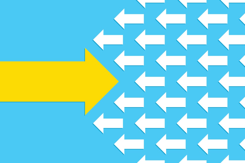 The Cost of Being Different