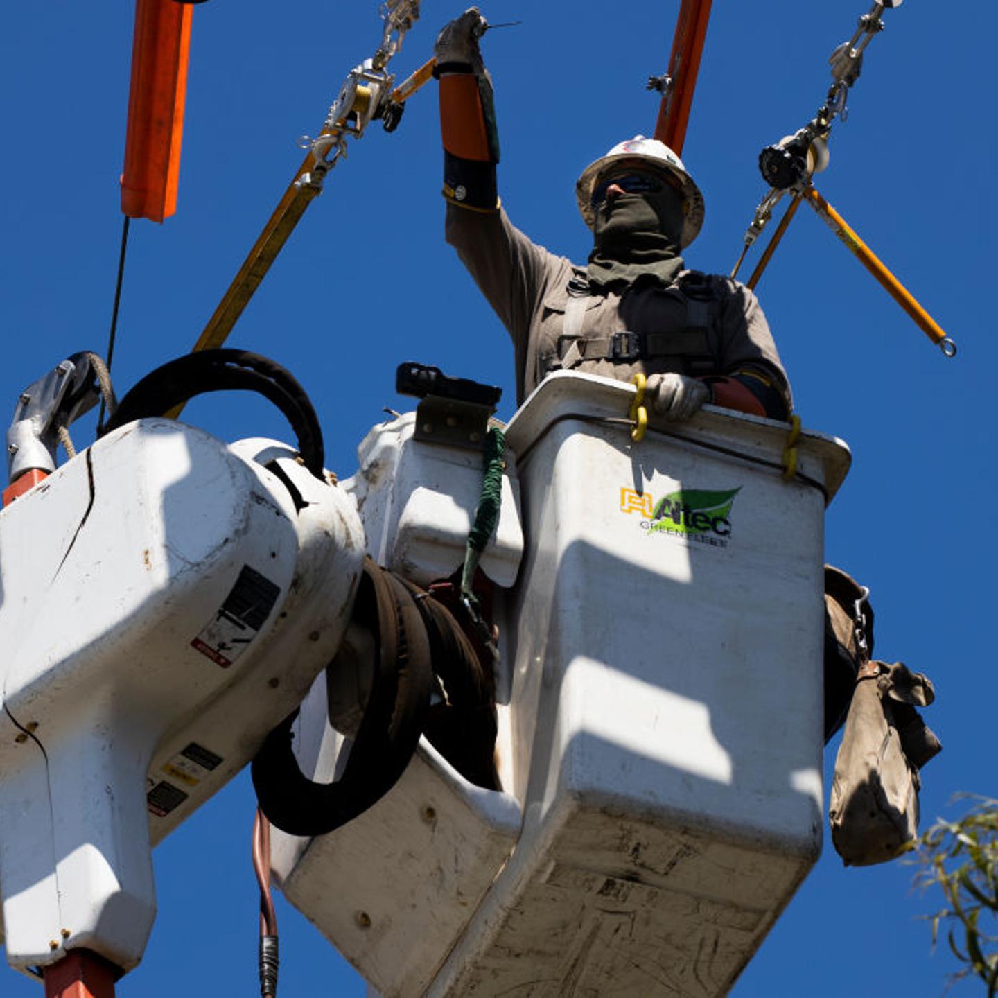 A power company does repairs in Ventura, California