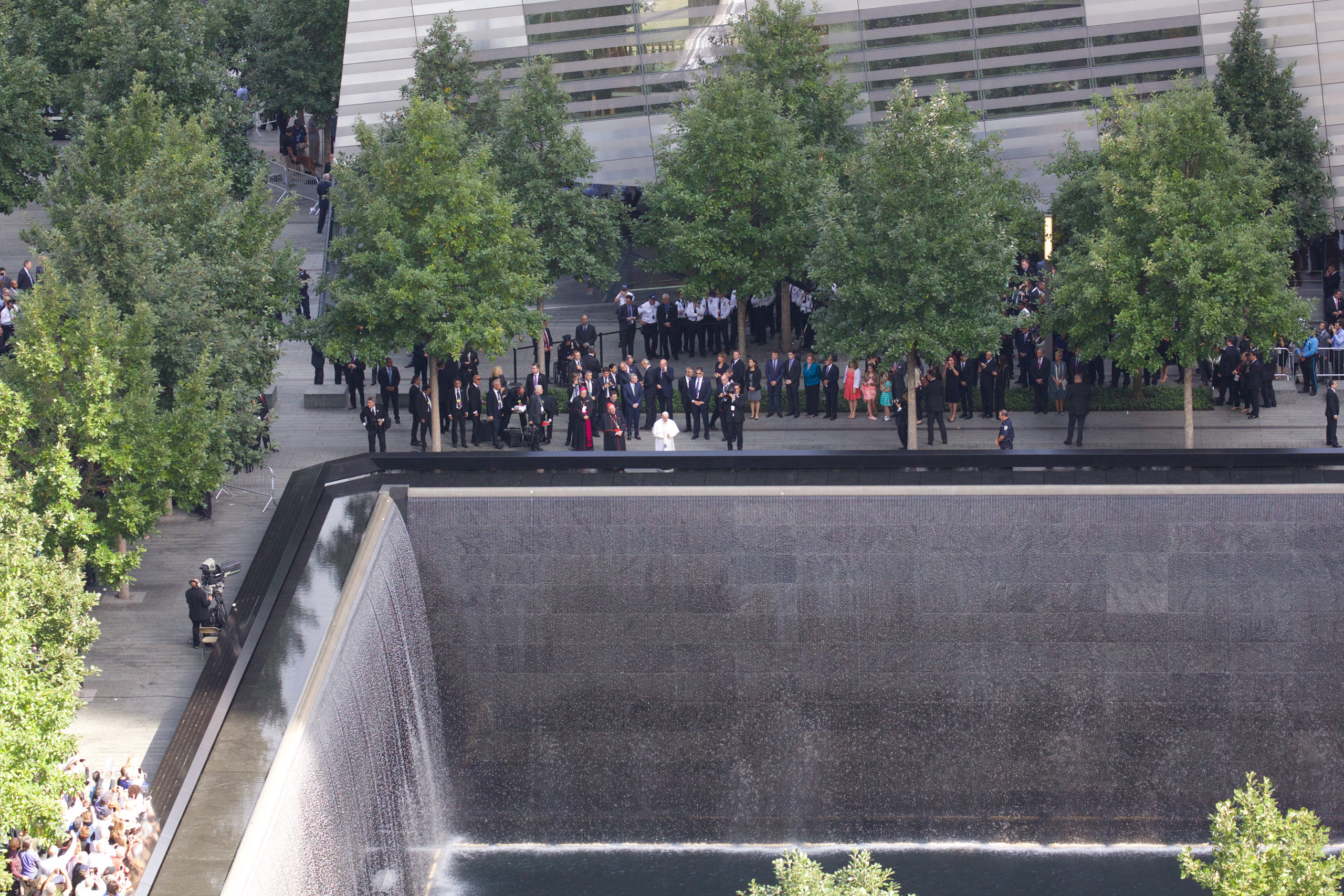 Pope Francis prays at the South Pool of the 9/11 Memorial in downtown Manhattan, Friday, Sept. 25, 2015, in New York, NY. Photograph by Tobias Hutzler for TIME