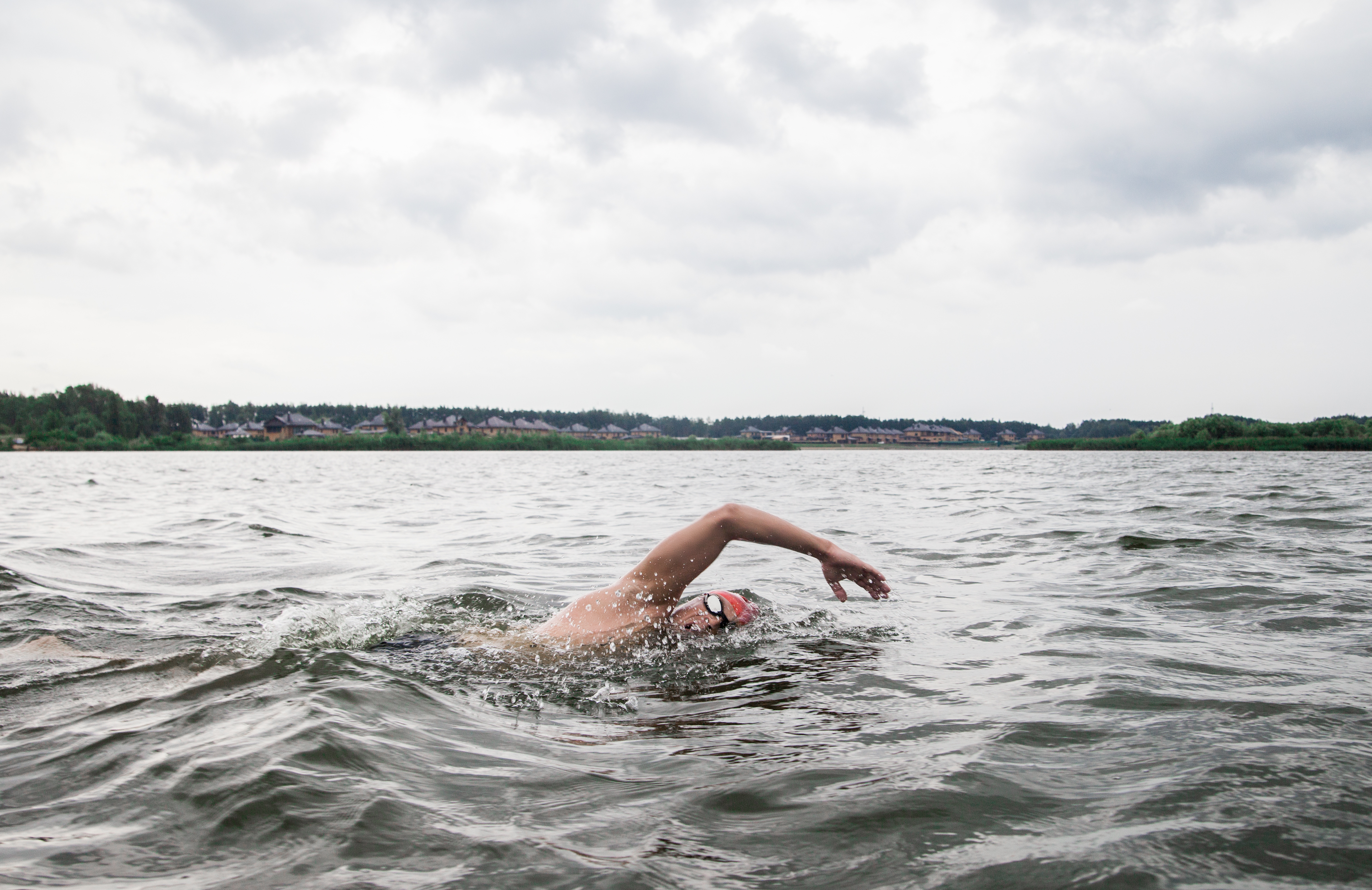 Man swimming in river