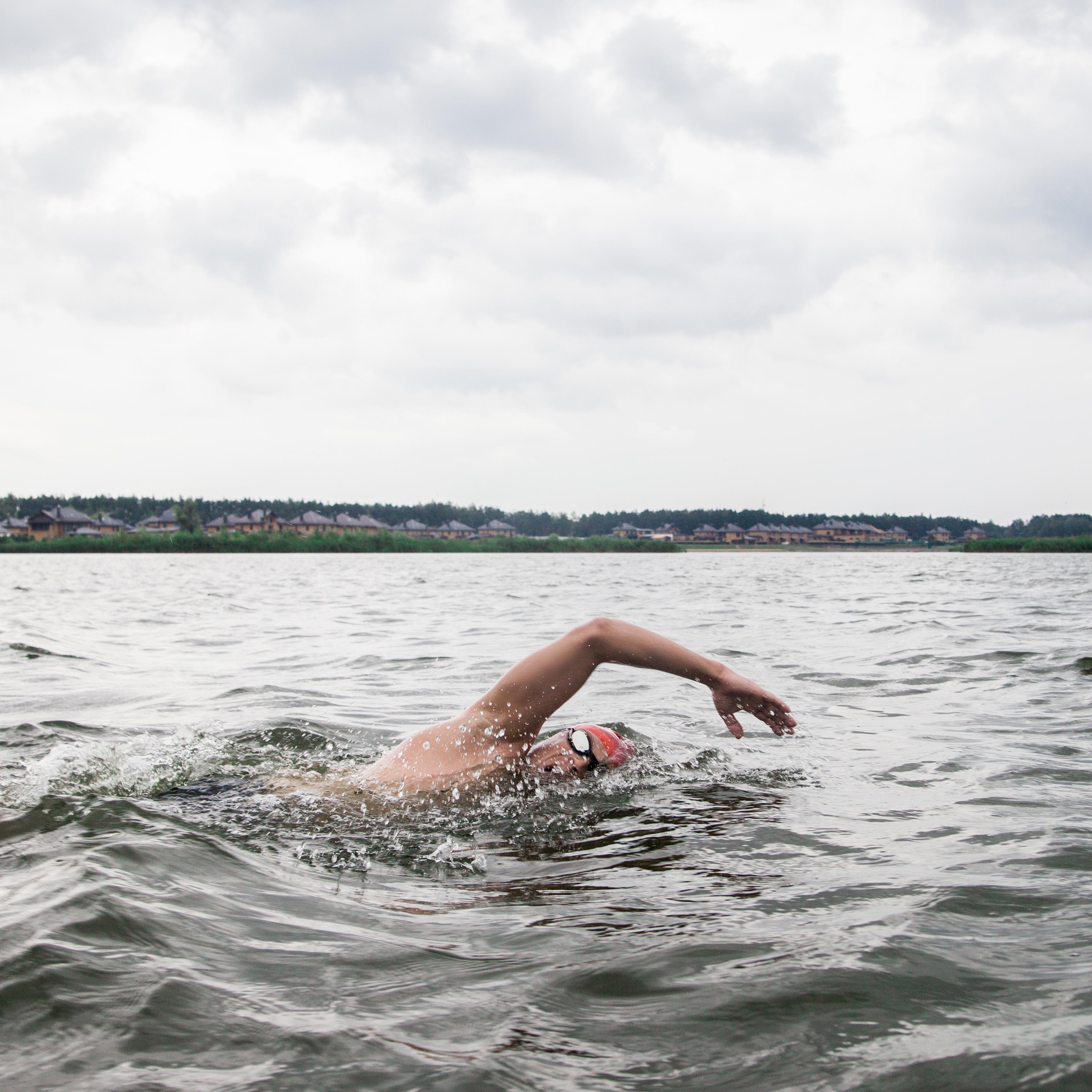 Man swimming in river