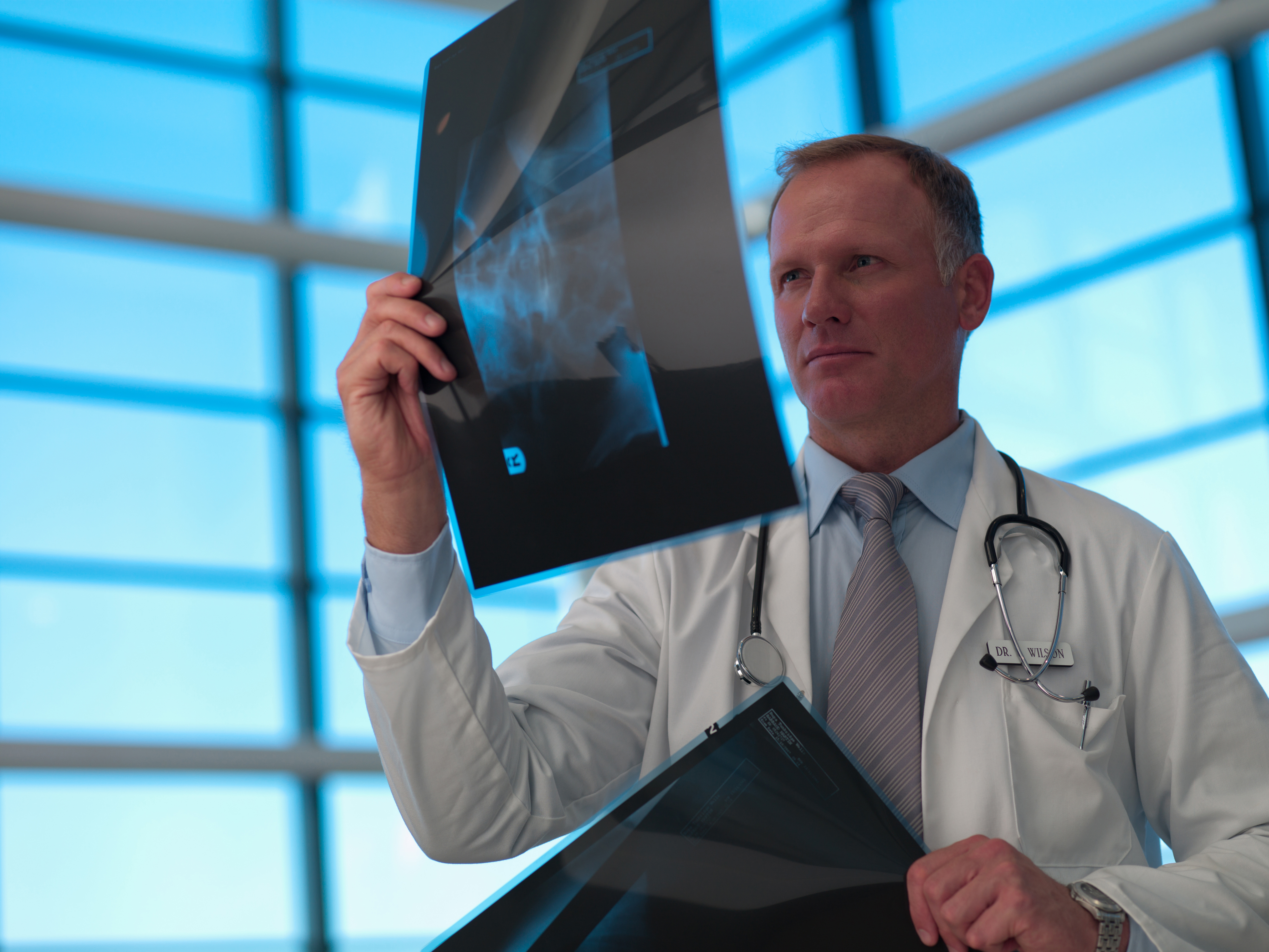 Doctor looking at x-ray