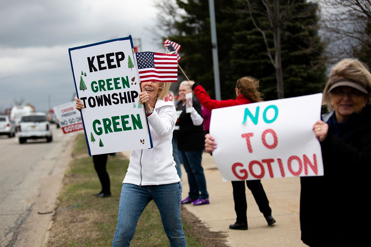 Protesters are seen near Ferris State University on Wednesday, April 5, 2023 in Big Rapids, MI.