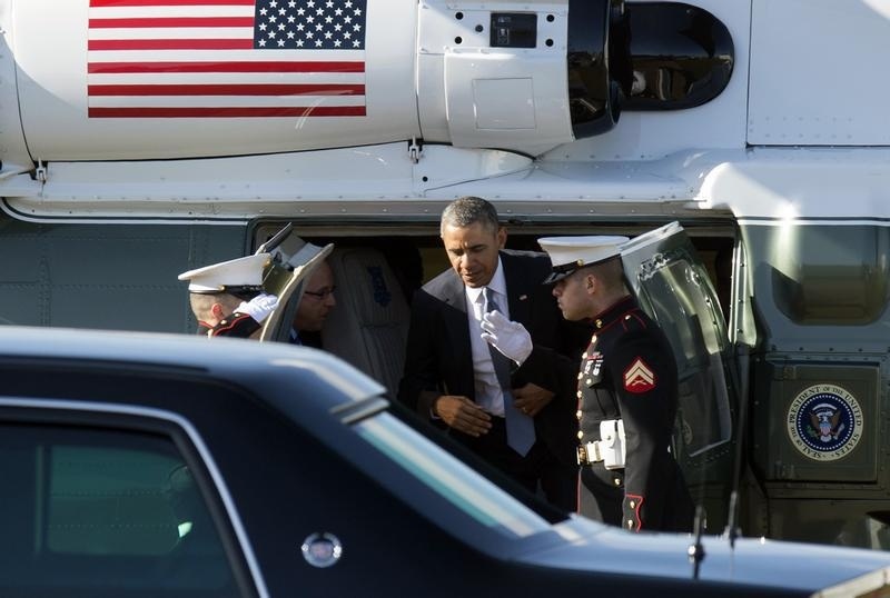 U.S. President  Obama leaves the Marine One helicopter as he arrives at the Rijksmuseum on the Museumplein in Amsterdam