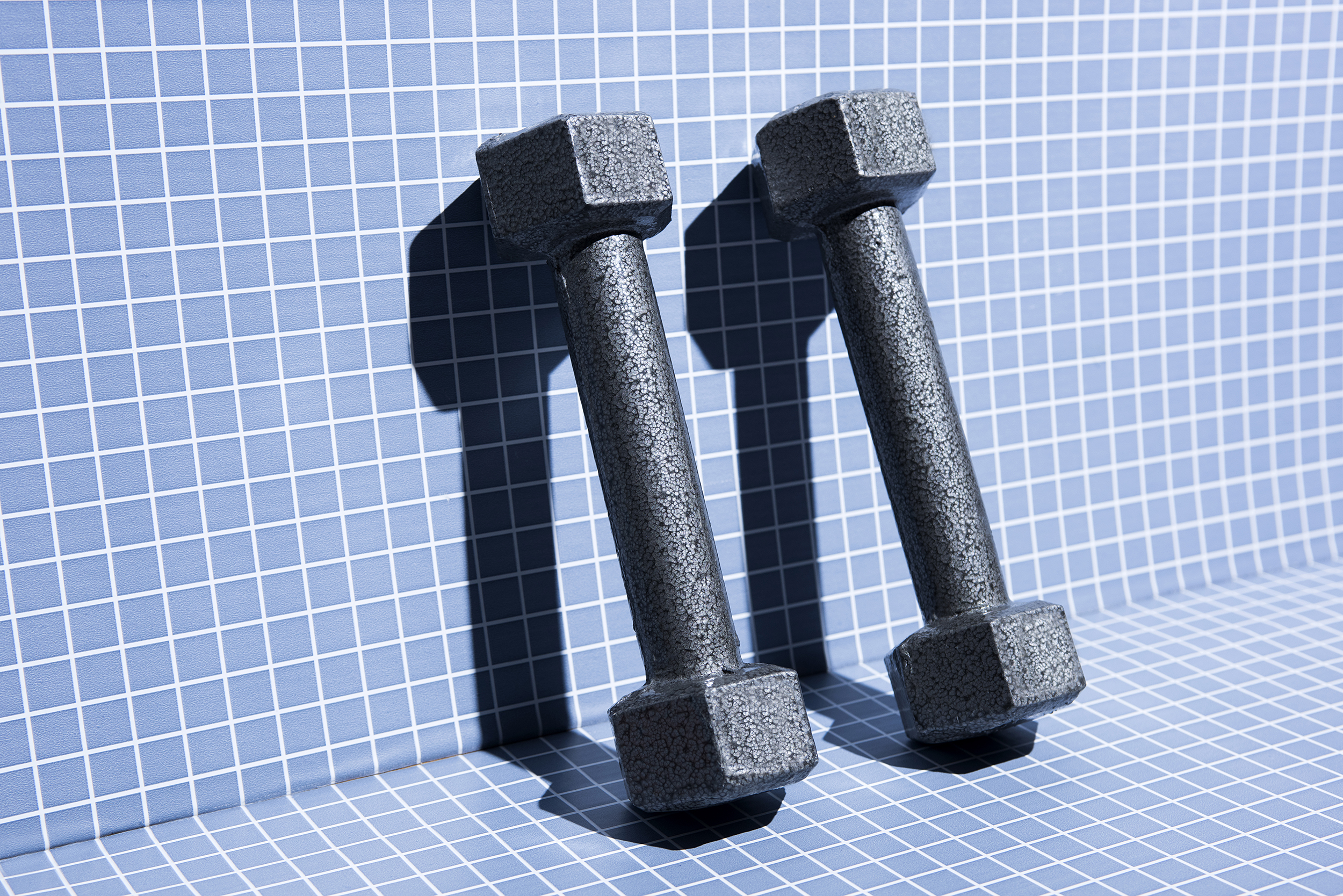 metal-weights-4-fitness-exercise-strength-health-betterment-body-image-motto-stock