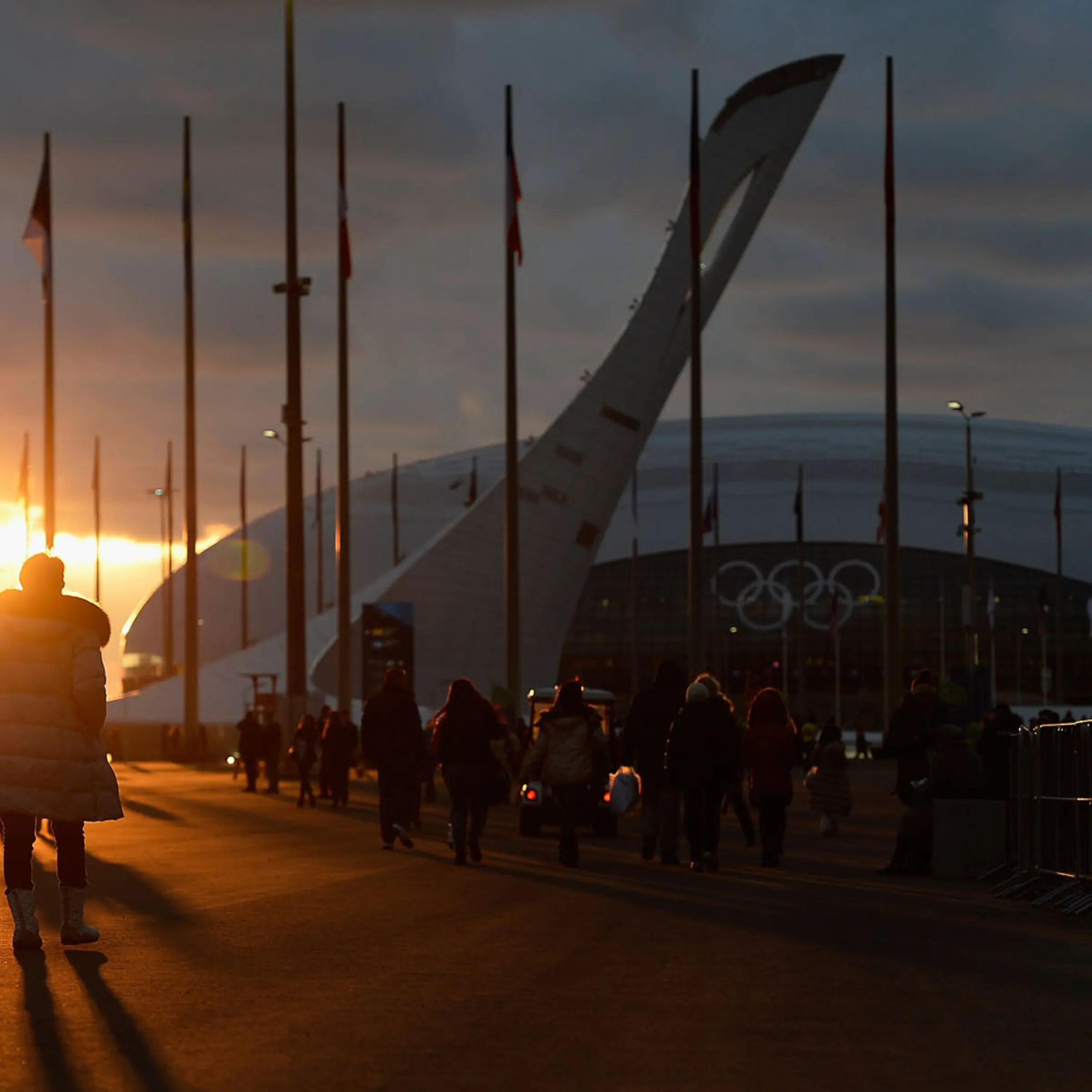 Visitors walk inside the Olympic Park prior to the Sochi 2014 Winter Olympics on February 6, 2014.