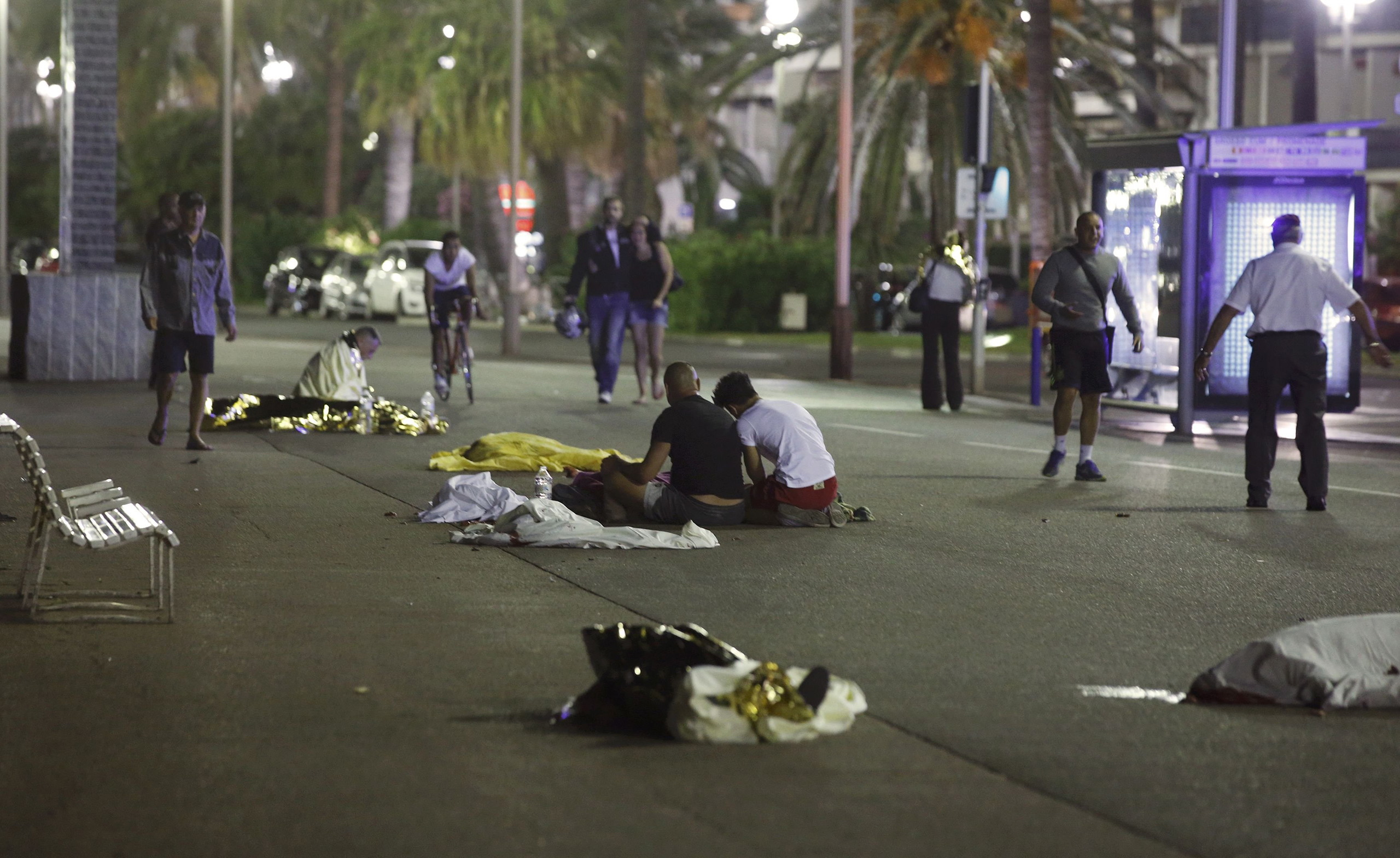Bodies are seen on the ground on July 15, 2016, after at least 70 people were killed in Nice, France, when a truck ran into a crowd celebrating Bastille Day.