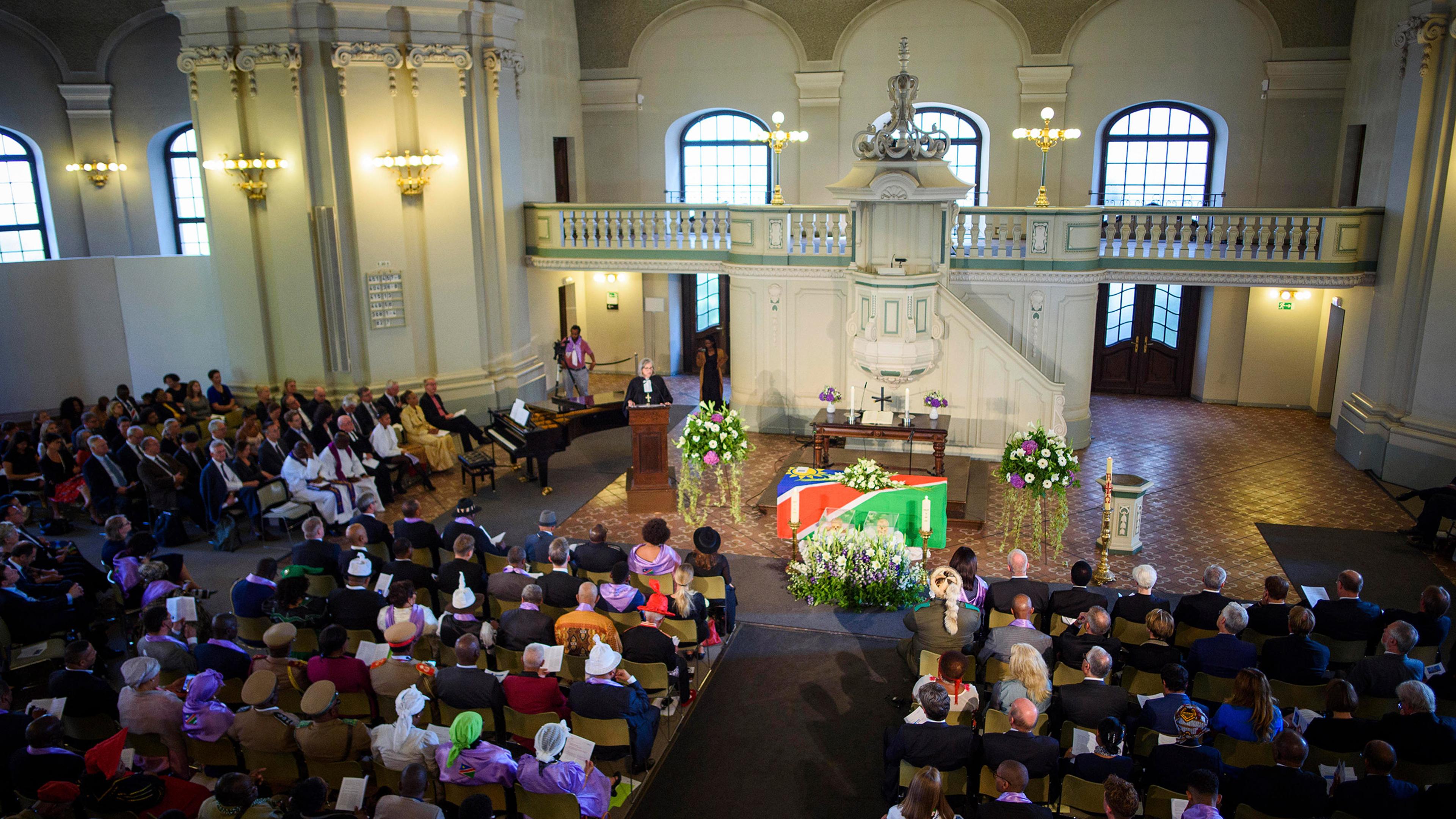 A ceremony is held for the victims of Namibian genocide, at the Friedrichstadt church in Berlin, on Aug. 29, 2018. At the invitation of the Evangelical Church and the Council of Churches in Namibia, the mortal remains of two victims of the genocide 1904-