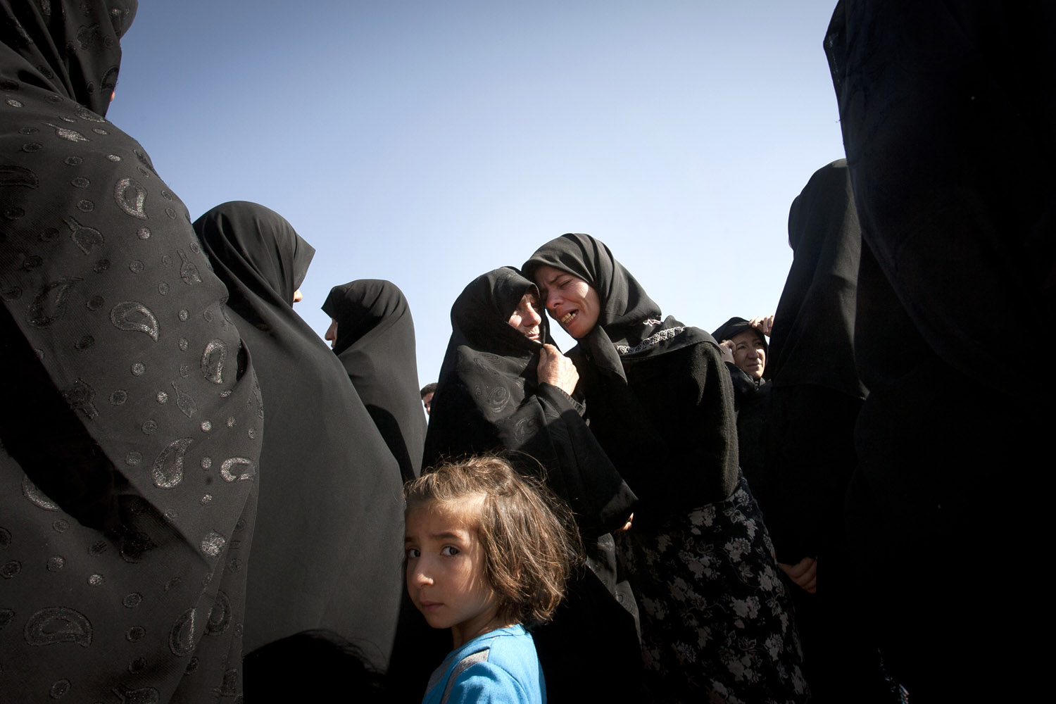 Aug. 12, 2012. Iranian women mourn after a deadly earthquake in northwest Iran. 