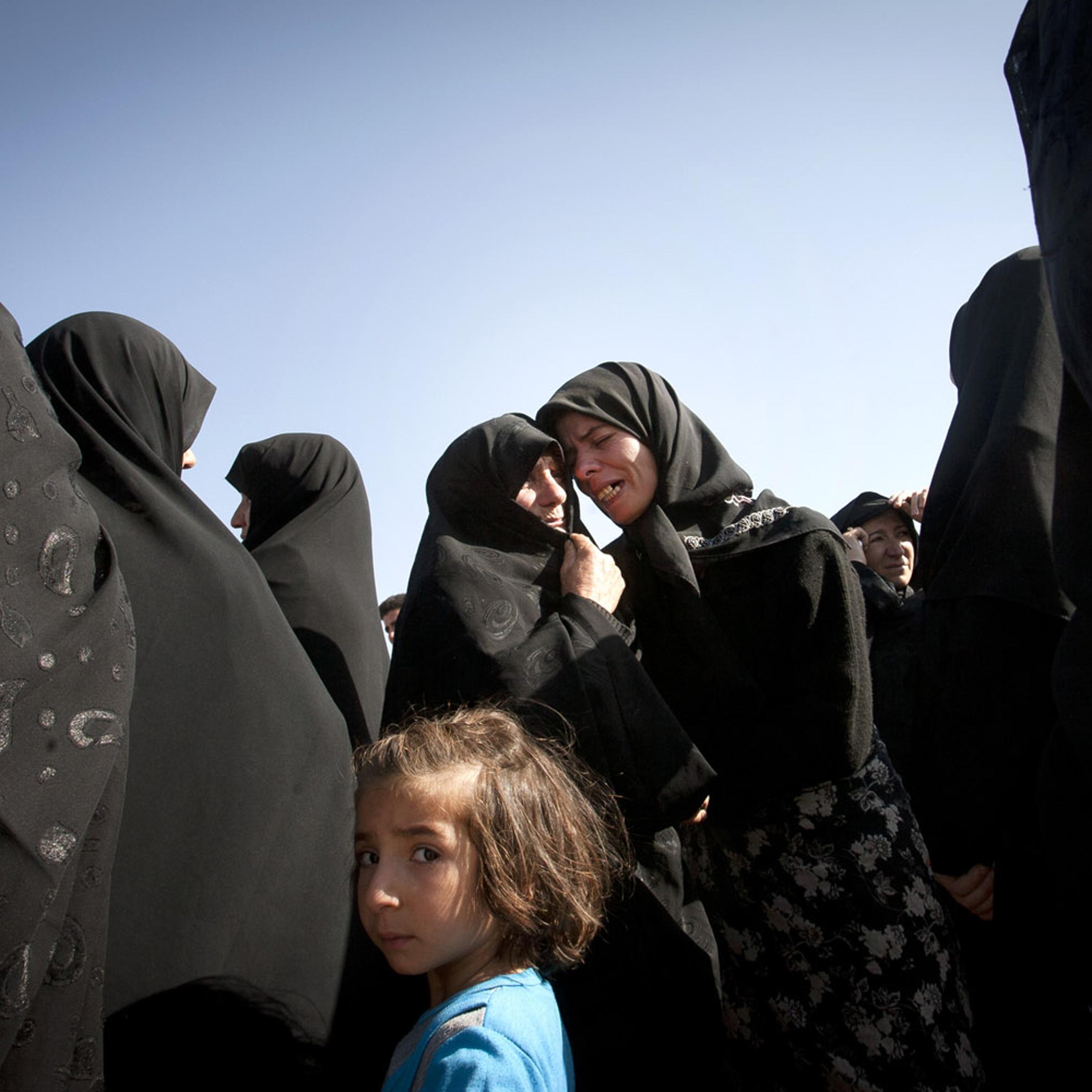 Aug. 12, 2012. Iranian women mourn after a deadly earthquake in northwest Iran.