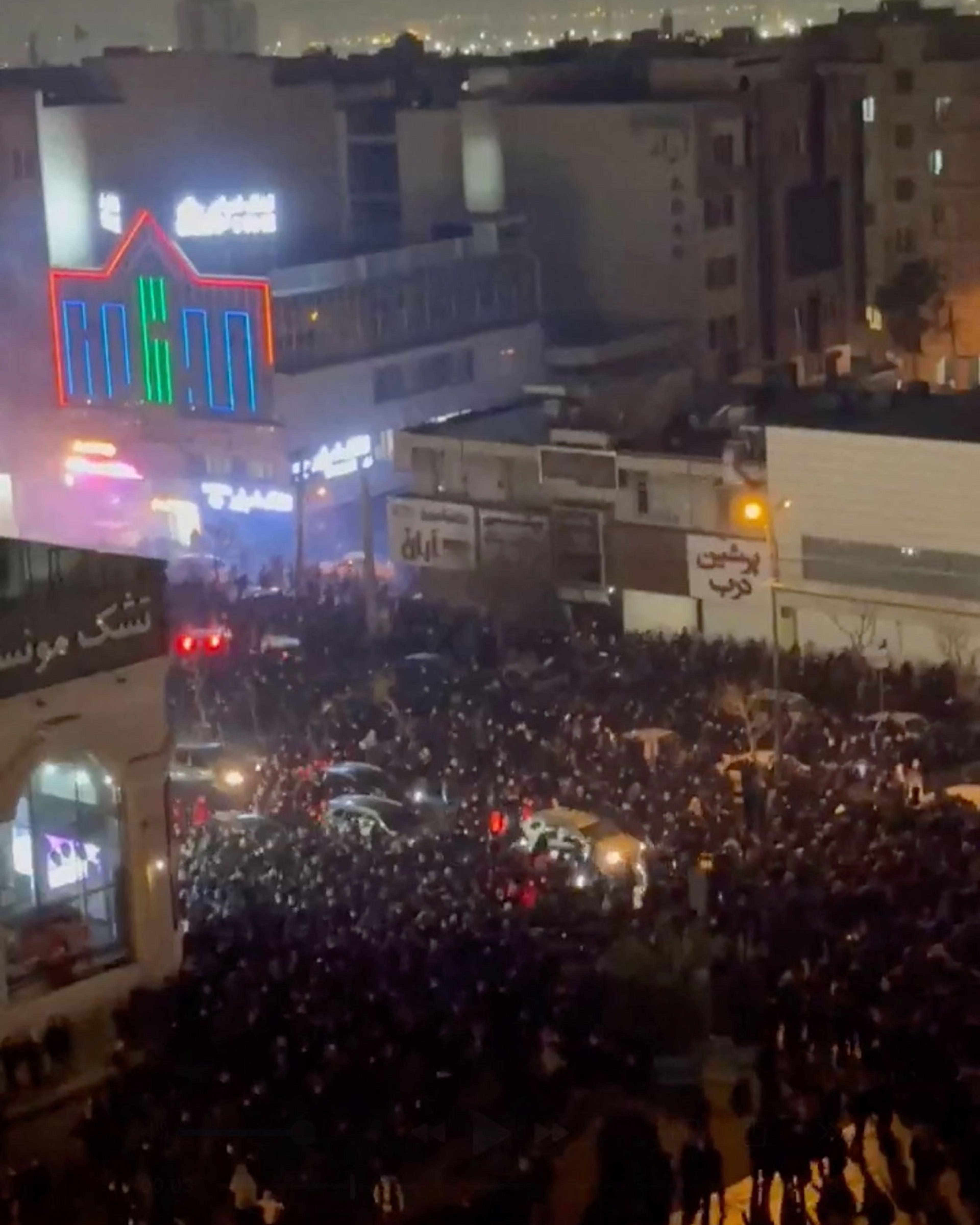 People gather on the streets amid anti-government unrest in Tehran