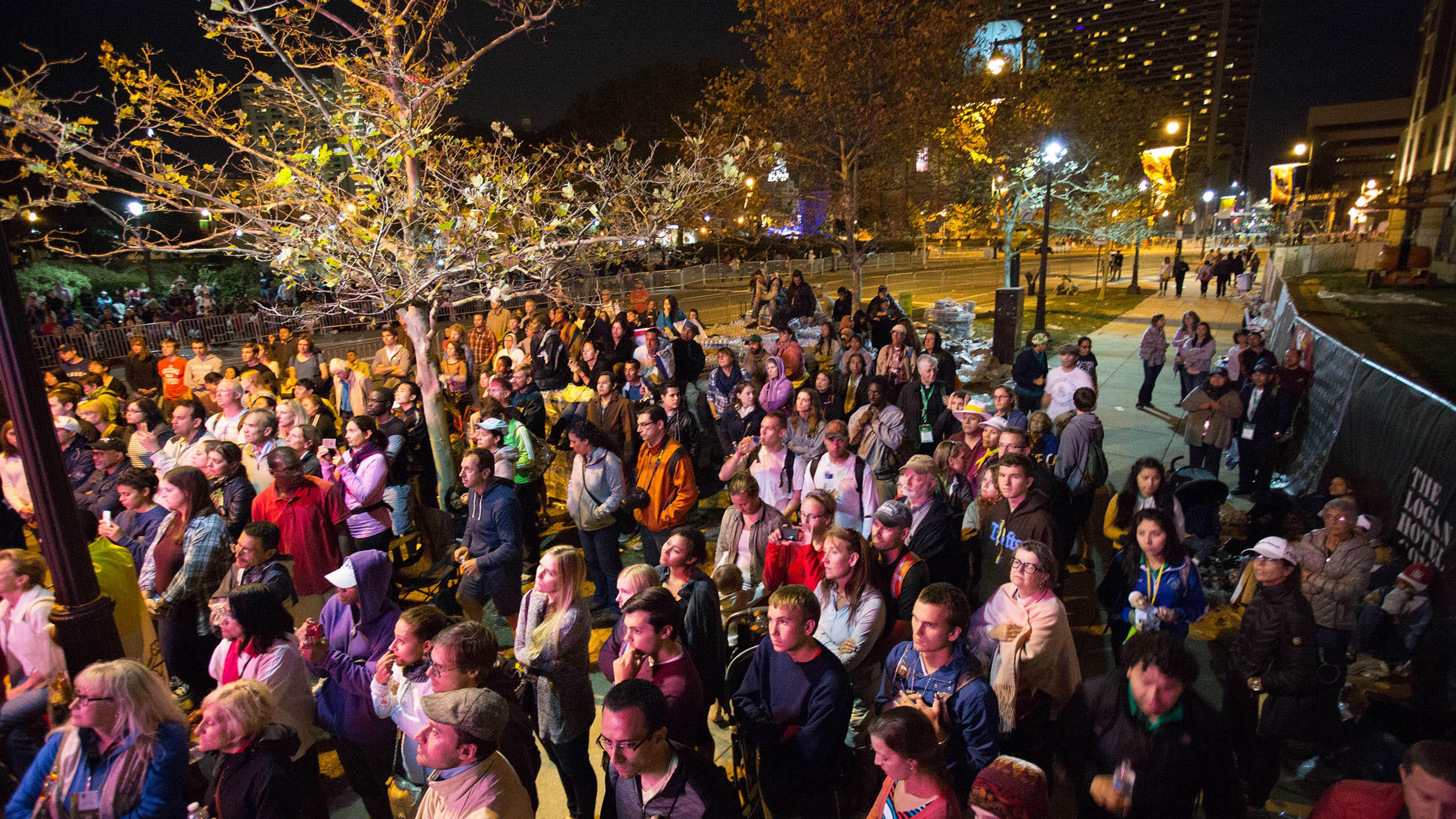 A crowd listens to Pope Francis while he speaks at the World Meeting of Families on Benjamin Franklin Parkway, in Philadelphia, PA. Sept, 26, 2015.