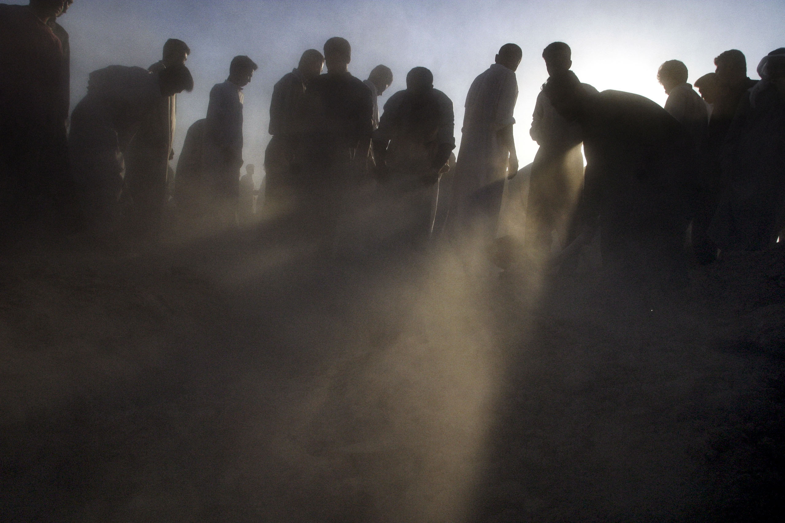 IIraqi mourners at a funeral in Fallujah, Iraq, for a man who was killed by American troops after they fired on a crowd of anti-American protesters, April 30, 2003.