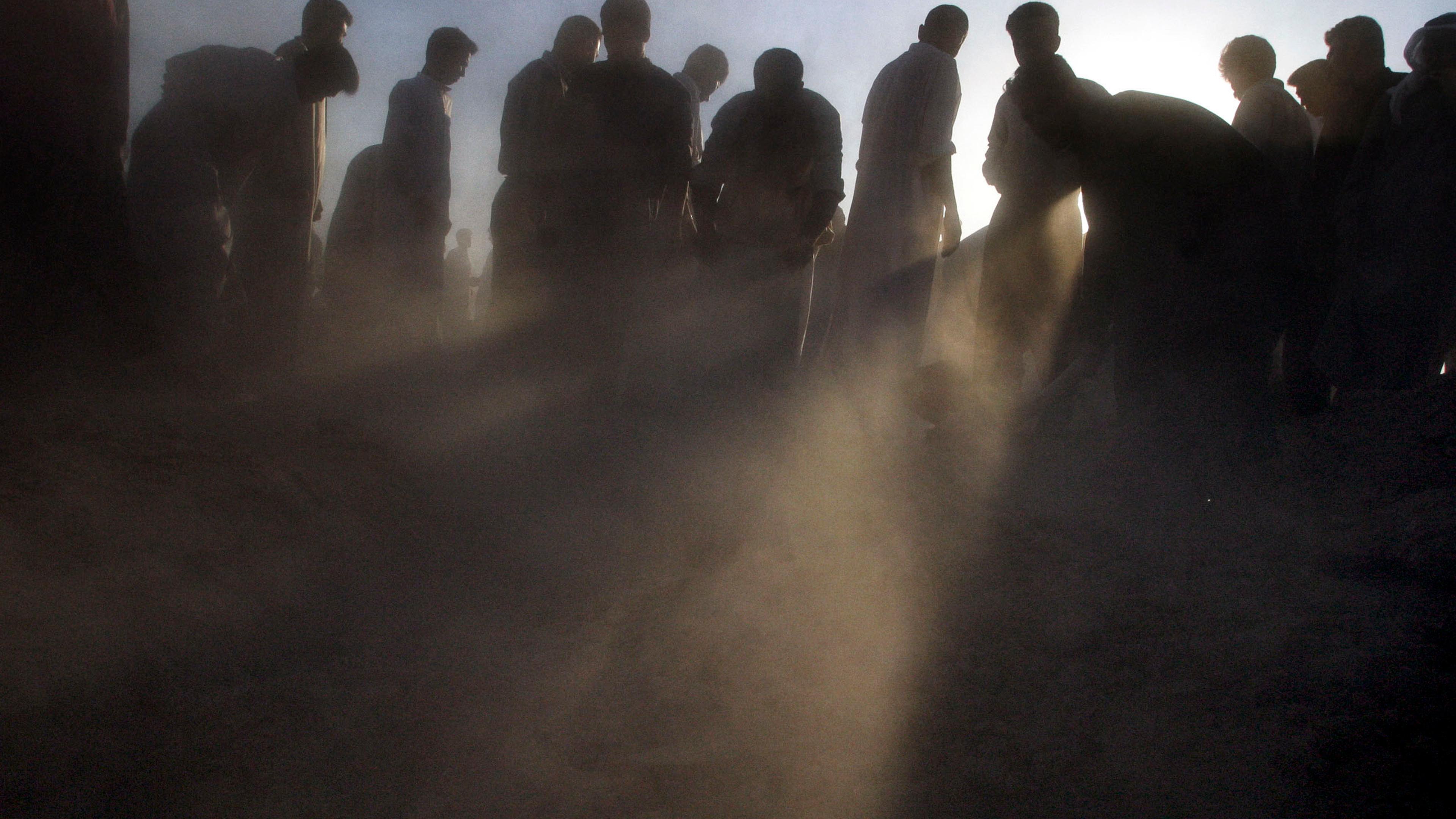 IIraqi mourners at a funeral in Fallujah, Iraq, for a man who was killed by American troops after they fired on a crowd of anti-American protesters, April 30, 2003.