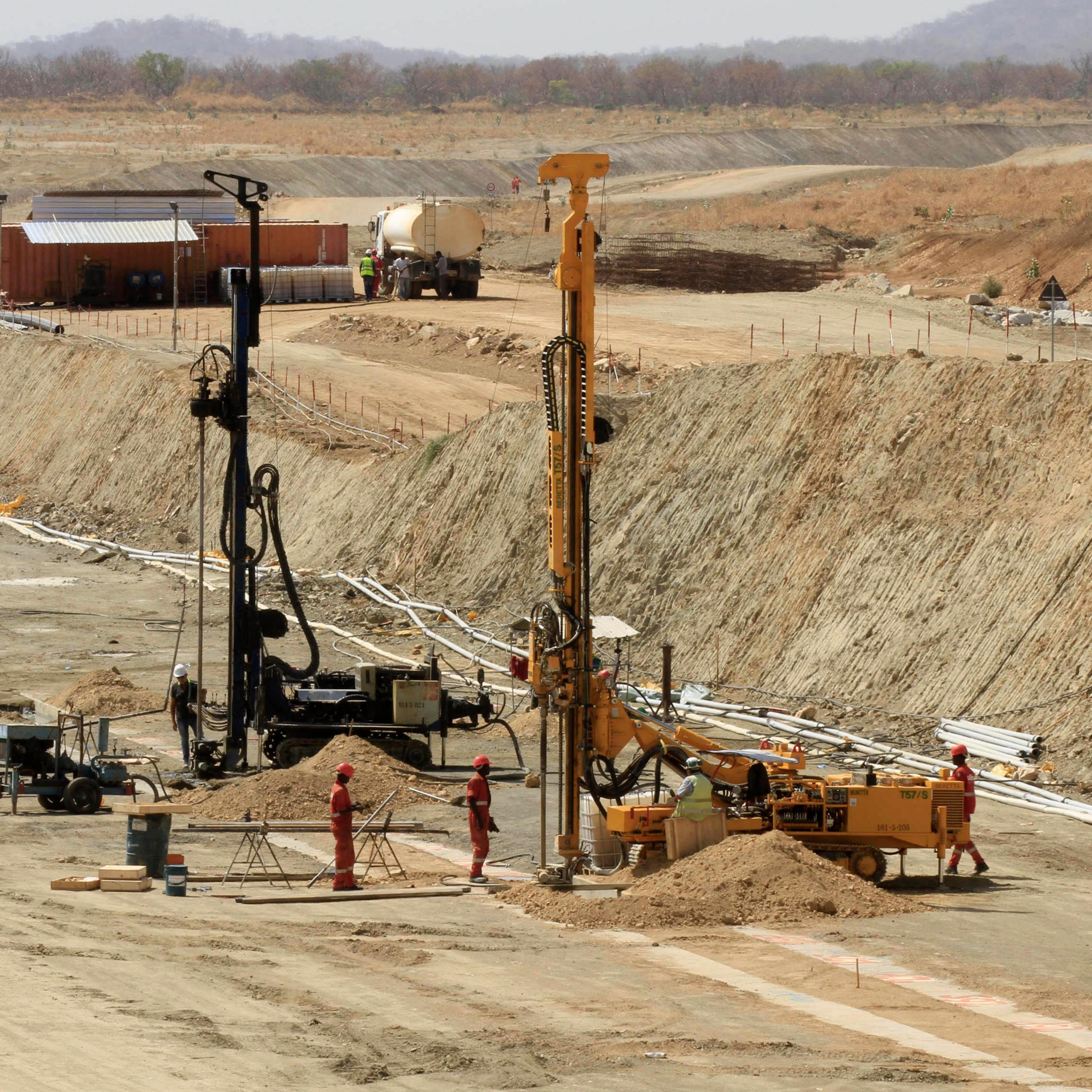 Laborers work at the Grand Ethiopian Renaissance Dam in Guba Woreda, Benishangul Gumuz region in Ethiopia, March 2014.