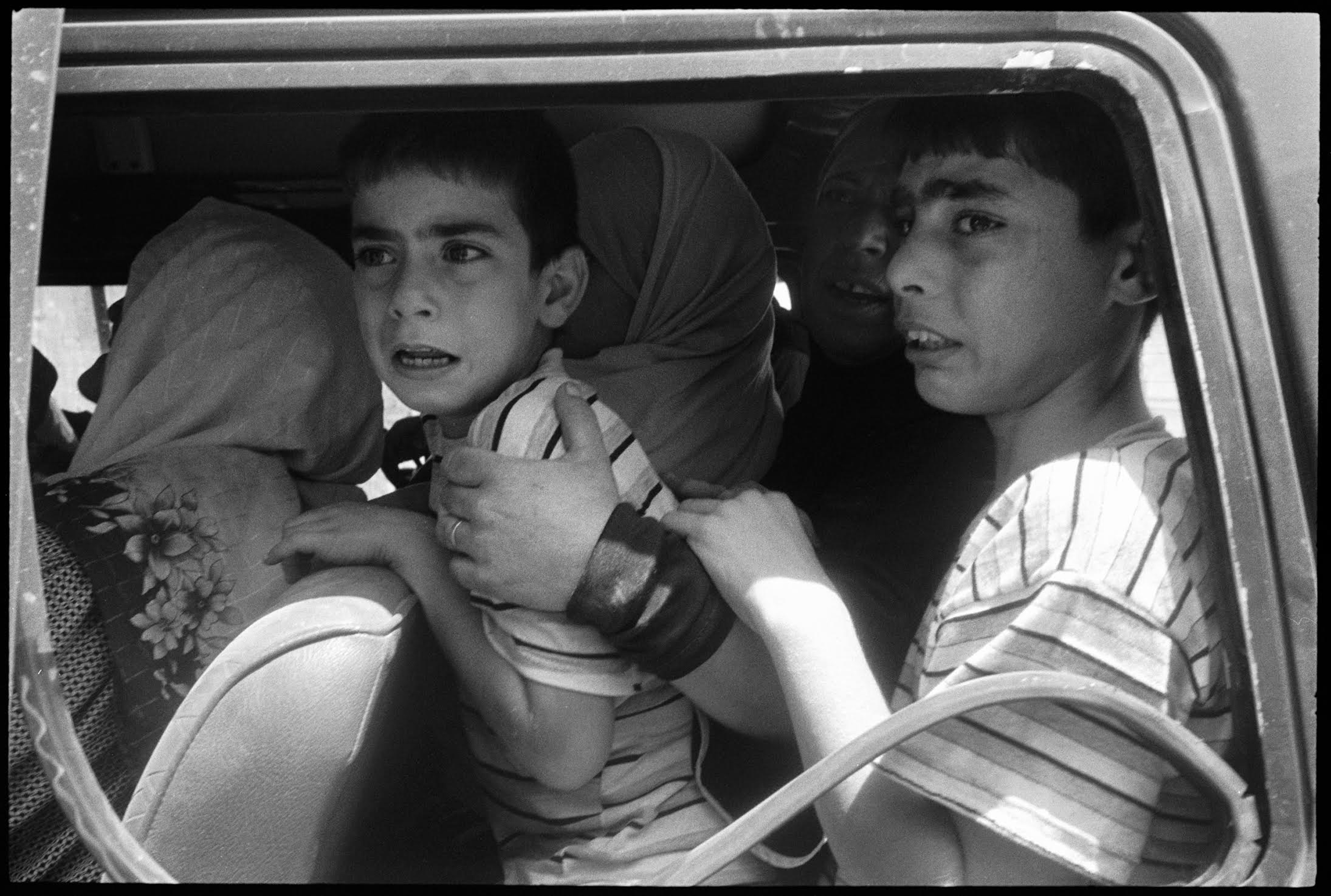 I'm a mother of two young boys now. I understand this photograph in a way that I wasn't capable of when I took it. We all took advantage of a temporary halt in Israeli air strikes in the middle of the war. Journalists were finally safer to drive around, 
