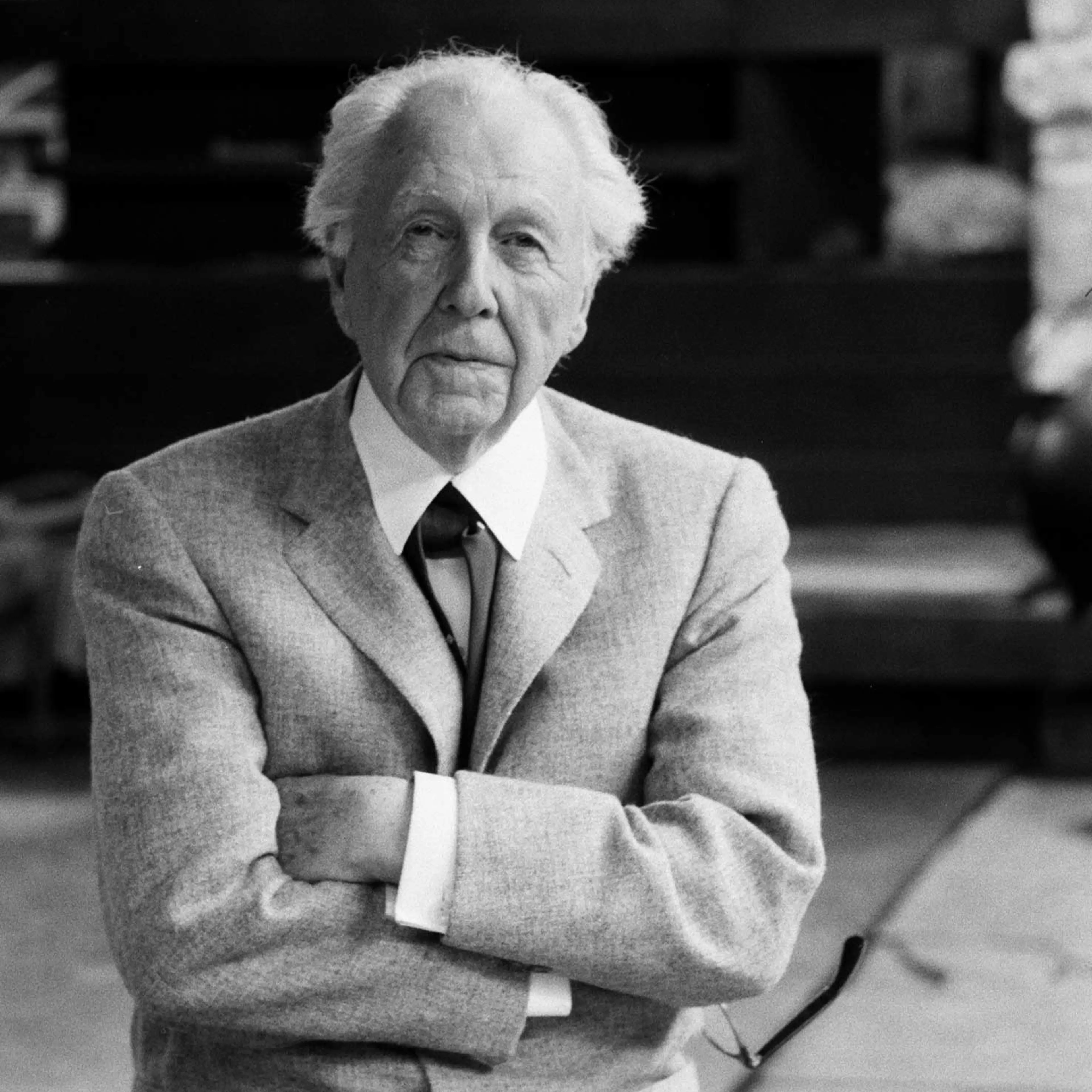Frank Lloyd Wright 89, works 12-hour day running fellowship for aspiring architects, dances and swims, says: "The more I abused my physical resources, the more I had."