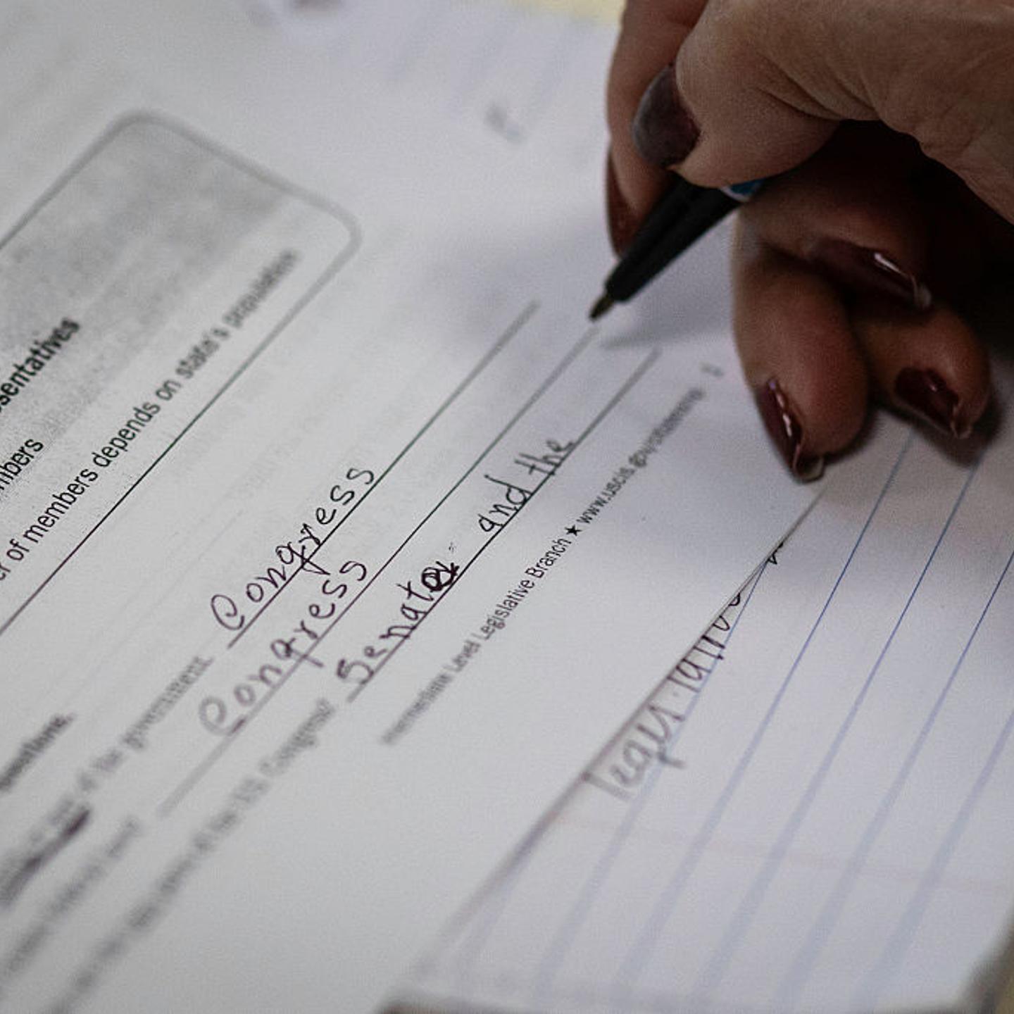 An immigrant studies to take a U.S. citizenship exam at an undisclosed location, Connecticut on March 29, 2025.