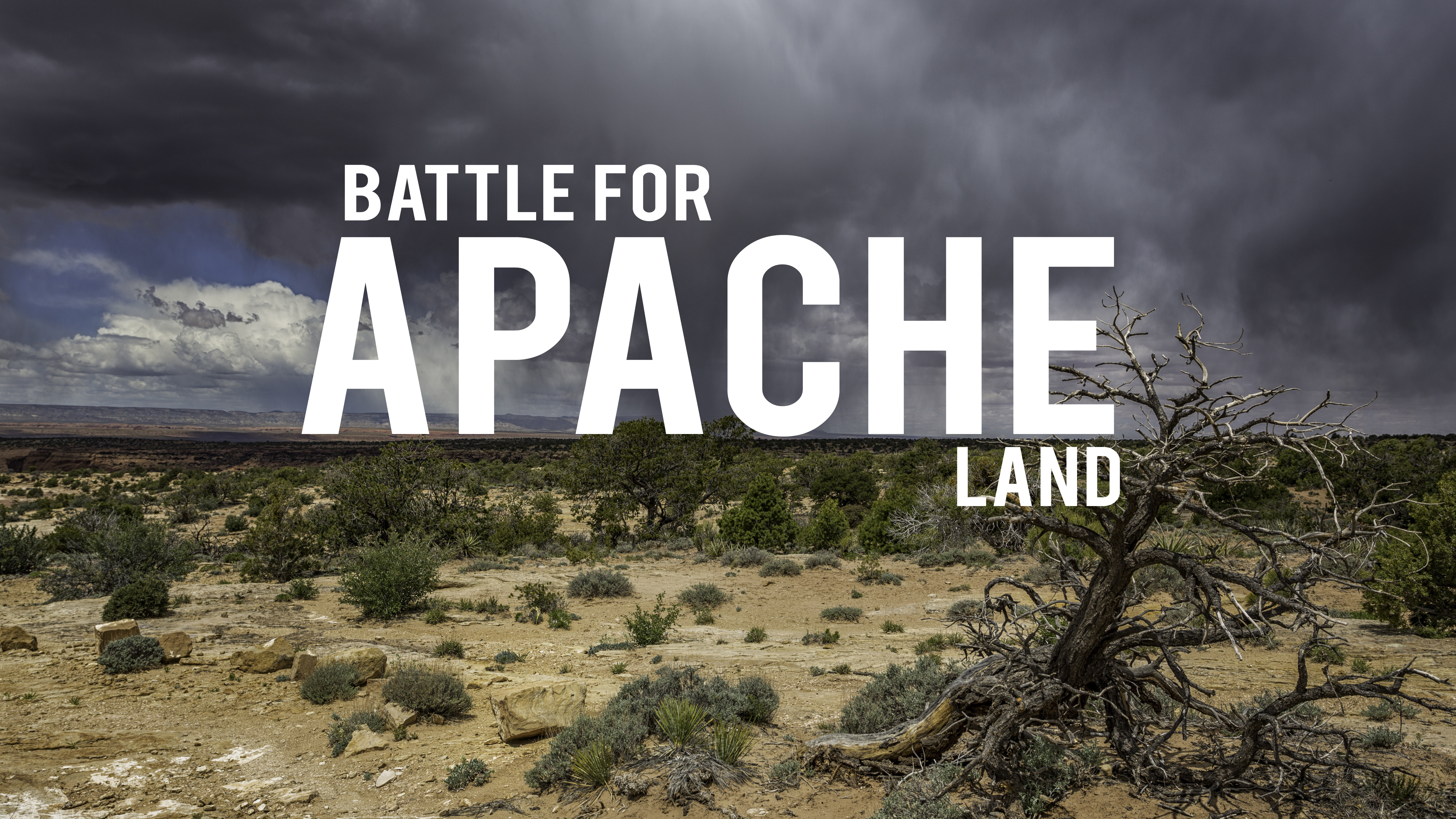 Caption:Image taken at the Canyon de Chelly grounds.As I was walking around the grounds I noticed that the blue sky had suddenly turned darker, immense and dramatic stormy clouds had formed at the horizon.